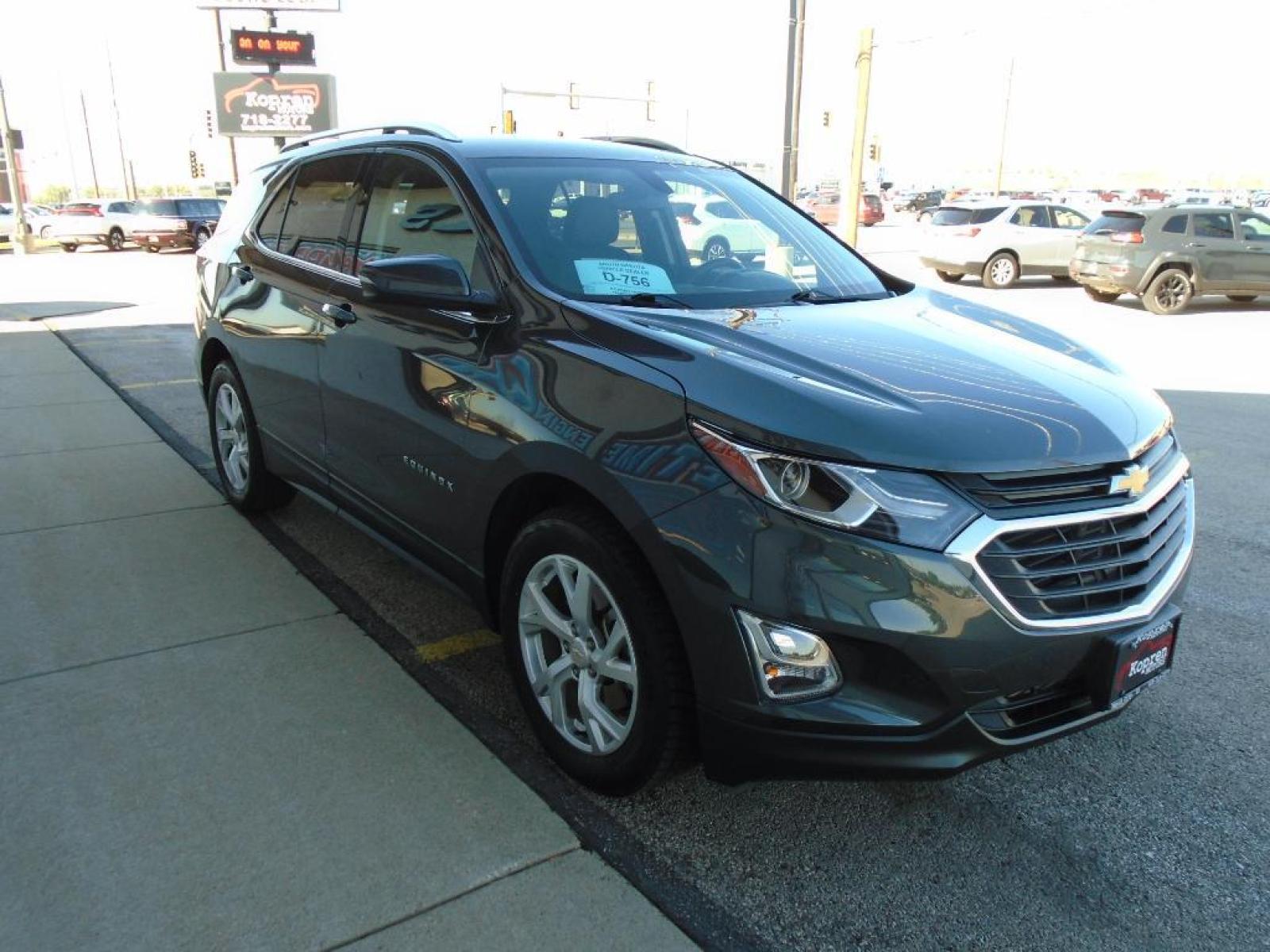 2019 Nightfall Gray Metallic Chevrolet Equinox LT (2GNAXVEX0K6) with an 2.0 liter 4 Cylinder Engine engine, 9-SPEED AUTOMATIC, ELECTRONICALLY-CONTROLLED WITH transmission, located at 222 N Cambell St., Rapid City, SD, 57701, (866) 420-2727, 44.081833, -103.191032 - This vehicle is a certified CARFAX 1-owner. This vehicle has a clean CARFAX vehicle history report. This 2019 Chevrolet Equinox is equipped with all wheel drive. Keep safely connected while in this Chevrolet Equinox with OnStar. You may enjoy services like Automatic Crash Response, Navigation, Road - Photo #3