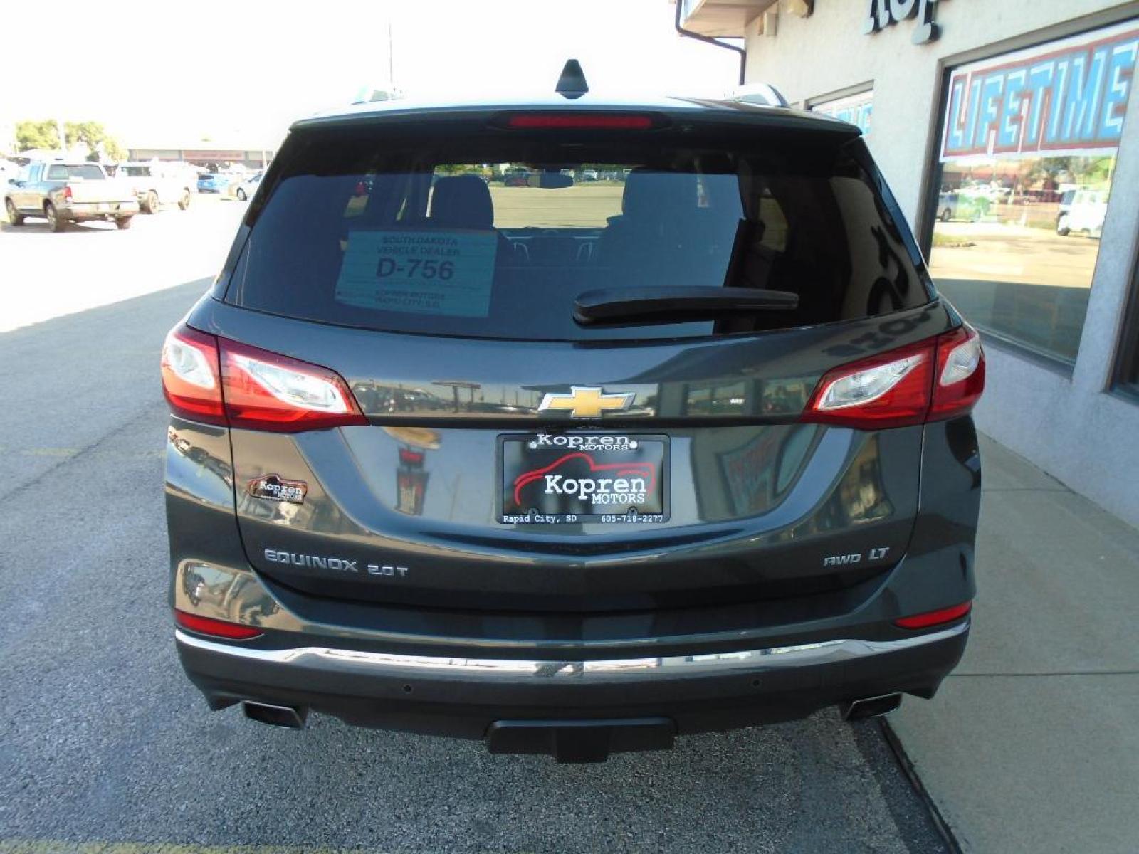 2019 Nightfall Gray Metallic Chevrolet Equinox LT (2GNAXVEX0K6) with an 2.0 liter 4 Cylinder Engine engine, 9-SPEED AUTOMATIC, ELECTRONICALLY-CONTROLLED WITH transmission, located at 222 N Cambell St., Rapid City, SD, 57701, (866) 420-2727, 44.081833, -103.191032 - This vehicle is a certified CARFAX 1-owner. This vehicle has a clean CARFAX vehicle history report. This 2019 Chevrolet Equinox is equipped with all wheel drive. Keep safely connected while in this Chevrolet Equinox with OnStar. You may enjoy services like Automatic Crash Response, Navigation, Road - Photo #5