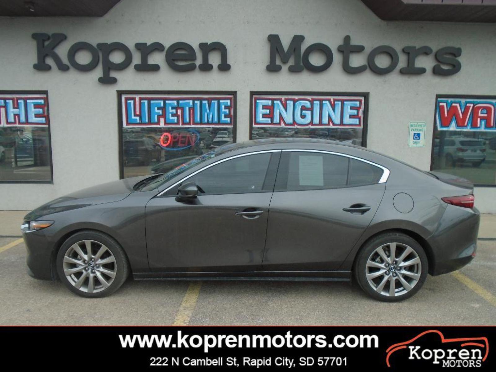 2020 GREY Mazda Mazda3 Premium Package (3MZBPAEM3LM) with an 2.5 liter 4 Cylinder Engine engine, 6-Speed SKYACTIV-DRIVE Automatic transmission, located at 222 N Cambell St., Rapid City, SD, 57701, (866) 420-2727, 44.081833, -103.191032 - Our dealership has already run the CARFAX report and it is clean. A clean CARFAX is a great asset for resale value in the future. Good News! This certified CARFAX 1-owner vehicle has only had one owner before you. Protect the Mazda Mazda3 from unwanted accidents with a cutting edge backup camera sy - Photo #0