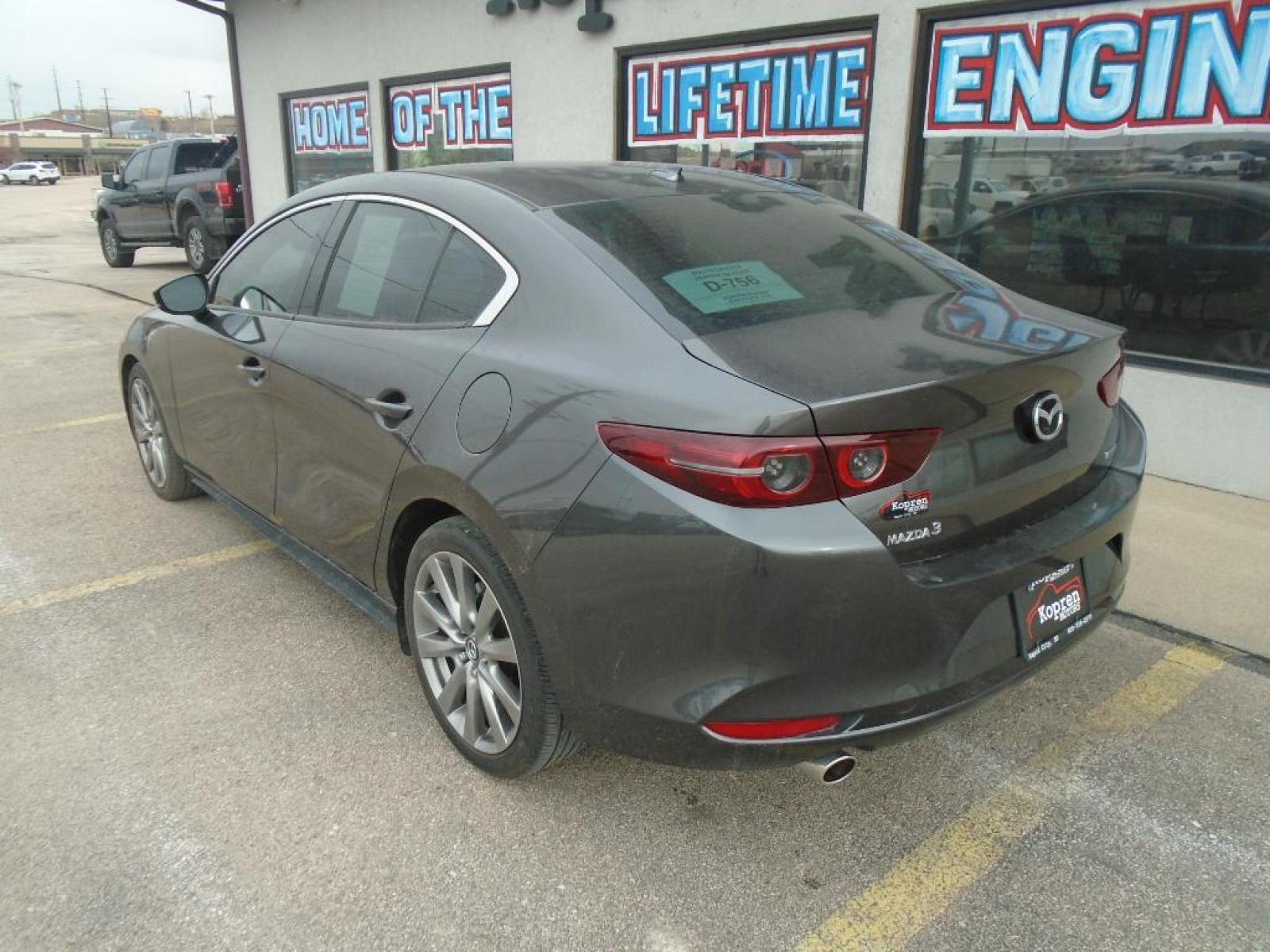 2020 GREY Mazda Mazda3 Premium Package (3MZBPAEM3LM) with an 2.5 liter 4 Cylinder Engine engine, 6-Speed SKYACTIV-DRIVE Automatic transmission, located at 222 N Cambell St., Rapid City, SD, 57701, (866) 420-2727, 44.081833, -103.191032 - Our dealership has already run the CARFAX report and it is clean. A clean CARFAX is a great asset for resale value in the future. Good News! This certified CARFAX 1-owner vehicle has only had one owner before you. Protect the Mazda Mazda3 from unwanted accidents with a cutting edge backup camera sy - Photo #1