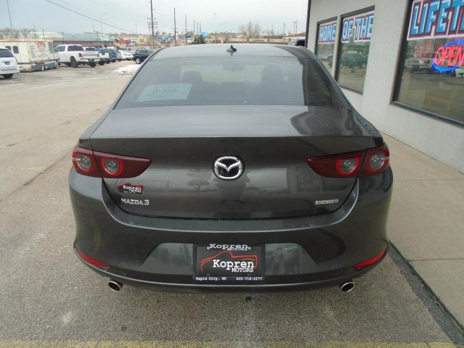 2020 GREY Mazda Mazda3 Premium Package (3MZBPAEM3LM) with an 2.5 liter 4 Cylinder Engine engine, 6-Speed SKYACTIV-DRIVE Automatic transmission, located at 222 N Cambell St., Rapid City, SD, 57701, (866) 420-2727, 44.081833, -103.191032 - Our dealership has already run the CARFAX report and it is clean. A clean CARFAX is a great asset for resale value in the future. Good News! This certified CARFAX 1-owner vehicle has only had one owner before you. Protect the Mazda Mazda3 from unwanted accidents with a cutting edge backup camera sy - Photo #2