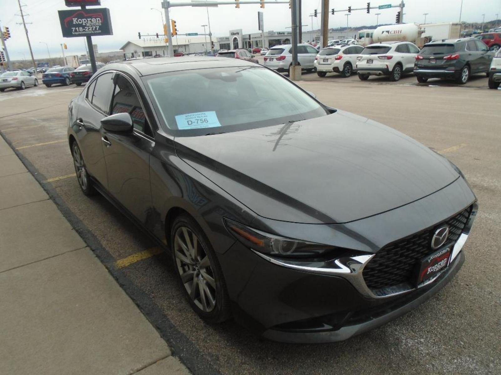 2020 GREY Mazda Mazda3 Premium Package (3MZBPAEM3LM) with an 2.5 liter 4 Cylinder Engine engine, 6-Speed SKYACTIV-DRIVE Automatic transmission, located at 222 N Cambell St., Rapid City, SD, 57701, (866) 420-2727, 44.081833, -103.191032 - Our dealership has already run the CARFAX report and it is clean. A clean CARFAX is a great asset for resale value in the future. Good News! This certified CARFAX 1-owner vehicle has only had one owner before you. Protect the Mazda Mazda3 from unwanted accidents with a cutting edge backup camera sy - Photo #4