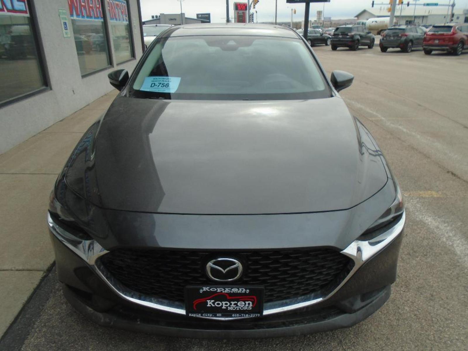 2020 GREY Mazda Mazda3 Premium Package (3MZBPAEM3LM) with an 2.5 liter 4 Cylinder Engine engine, 6-Speed SKYACTIV-DRIVE Automatic transmission, located at 222 N Cambell St., Rapid City, SD, 57701, (866) 420-2727, 44.081833, -103.191032 - Our dealership has already run the CARFAX report and it is clean. A clean CARFAX is a great asset for resale value in the future. Good News! This certified CARFAX 1-owner vehicle has only had one owner before you. Protect the Mazda Mazda3 from unwanted accidents with a cutting edge backup camera sy - Photo #5