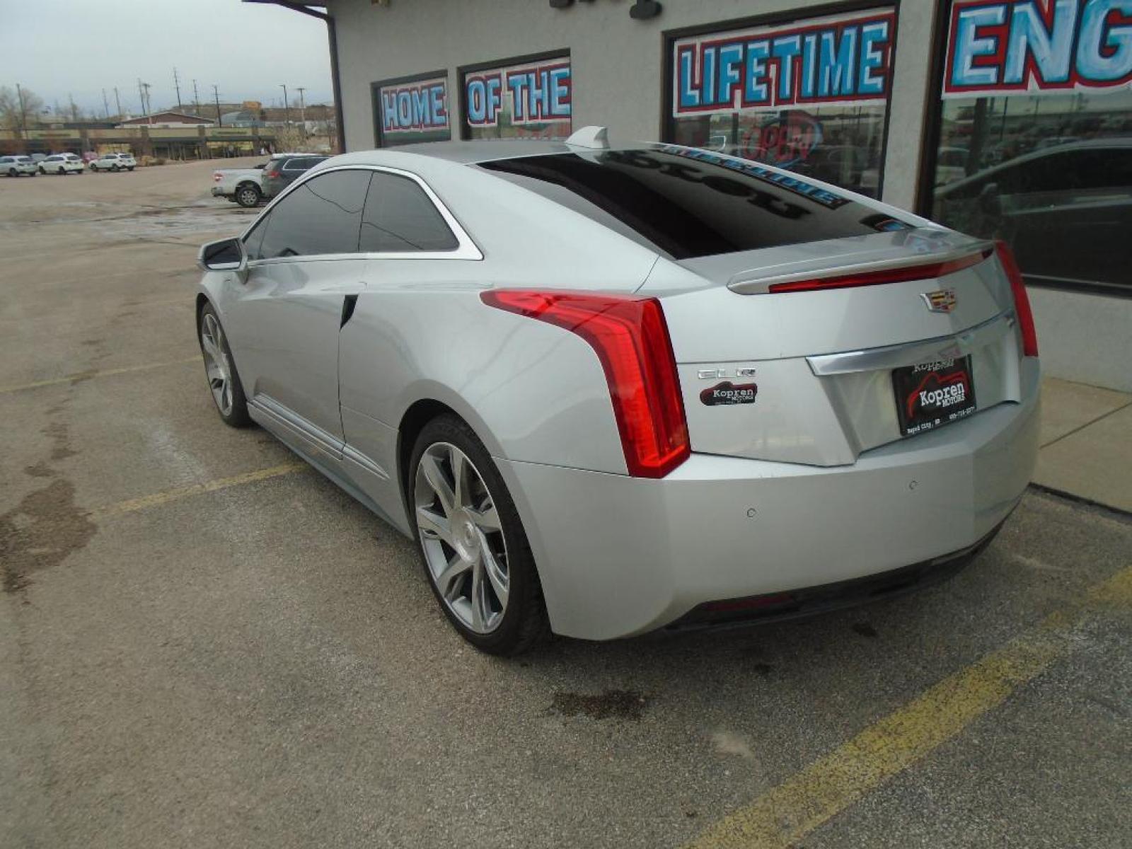 2014 Radiant Silver Metallic Cadillac ELR Luxury (1G6RM1E42EU) with an 1.4 liter 4 Cylinder Engine engine, ELECTRIC DRIVE transmission, located at 222 N Cambell St., Rapid City, SD, 57701, (866) 420-2727, 44.081833, -103.191032 - This vehicle features a high end BOSE stereo system. This small car features a hands-free Bluetooth phone system. Enjoy the heated seats in it you will never buy a vehicle without them. Everyone loves the comfort of having a warm seat on those cold winter days. Protect this 2014 Cadillac ELR from - Photo #1