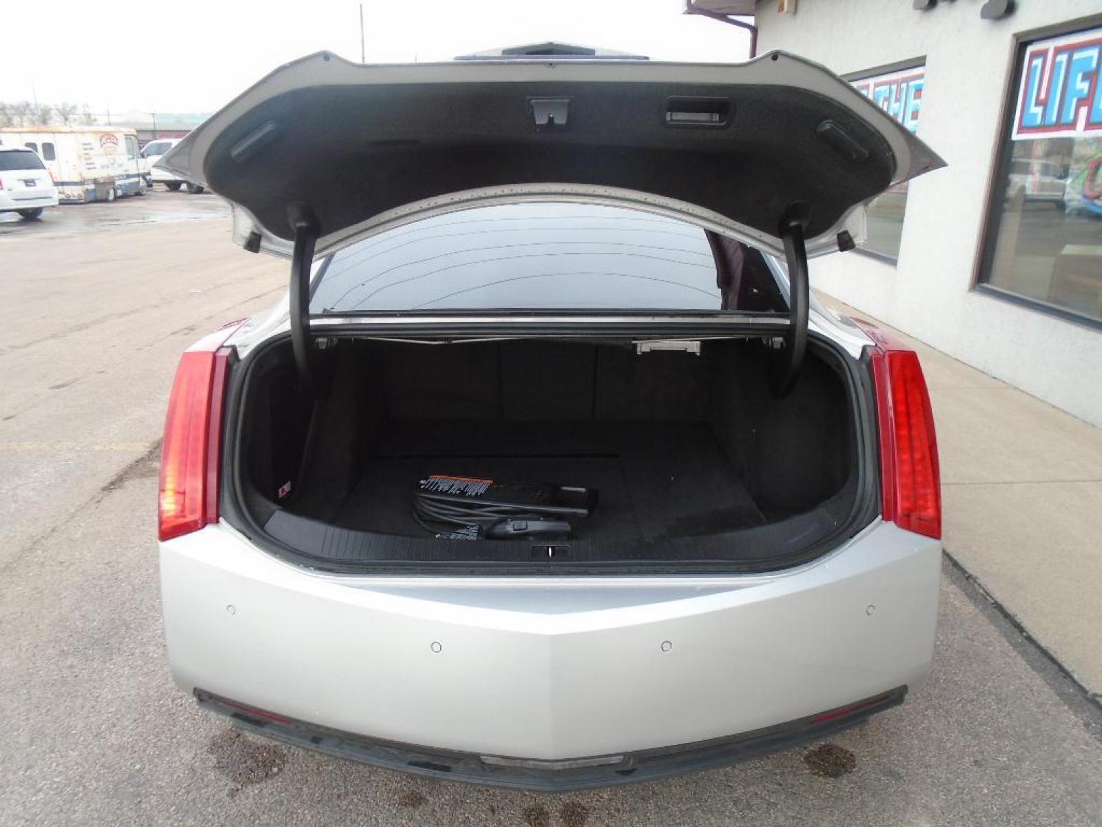 2014 Radiant Silver Metallic Cadillac ELR Luxury (1G6RM1E42EU) with an 1.4 liter 4 Cylinder Engine engine, ELECTRIC DRIVE transmission, located at 222 N Cambell St., Rapid City, SD, 57701, (866) 420-2727, 44.081833, -103.191032 - This vehicle features a high end BOSE stereo system. This small car features a hands-free Bluetooth phone system. Enjoy the heated seats in it you will never buy a vehicle without them. Everyone loves the comfort of having a warm seat on those cold winter days. Protect this 2014 Cadillac ELR from - Photo #27
