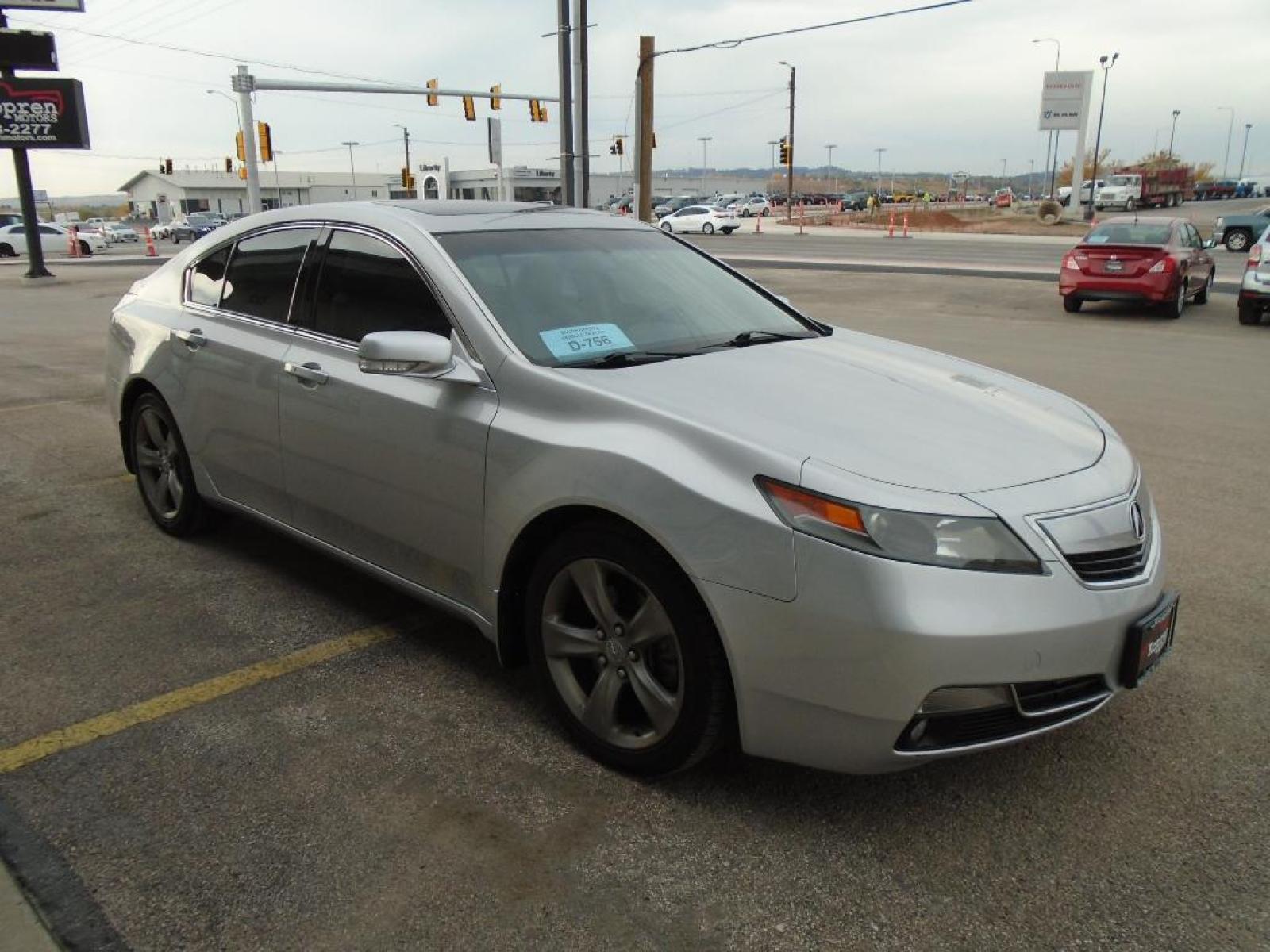 2012 SILVER Acura TL Tech Auto (19UUA9F53CA) with an 3.7 liter V6 Cylinder Engine engine, Automatic transmission, located at 222 N Cambell St., Rapid City, SD, 57701, (866) 420-2727, 44.081833, -103.191032 - The vehicle is equipped with the latest generation of XM/Sirius Radio. Night driving with HID Xenon headlamps is a breeze in the vehicle. This 2012 Acura TL has satellite radio capabilities. The HID headlamps on the vehicle light your way like never before. It shines with an exquisite metallic silv - Photo #3