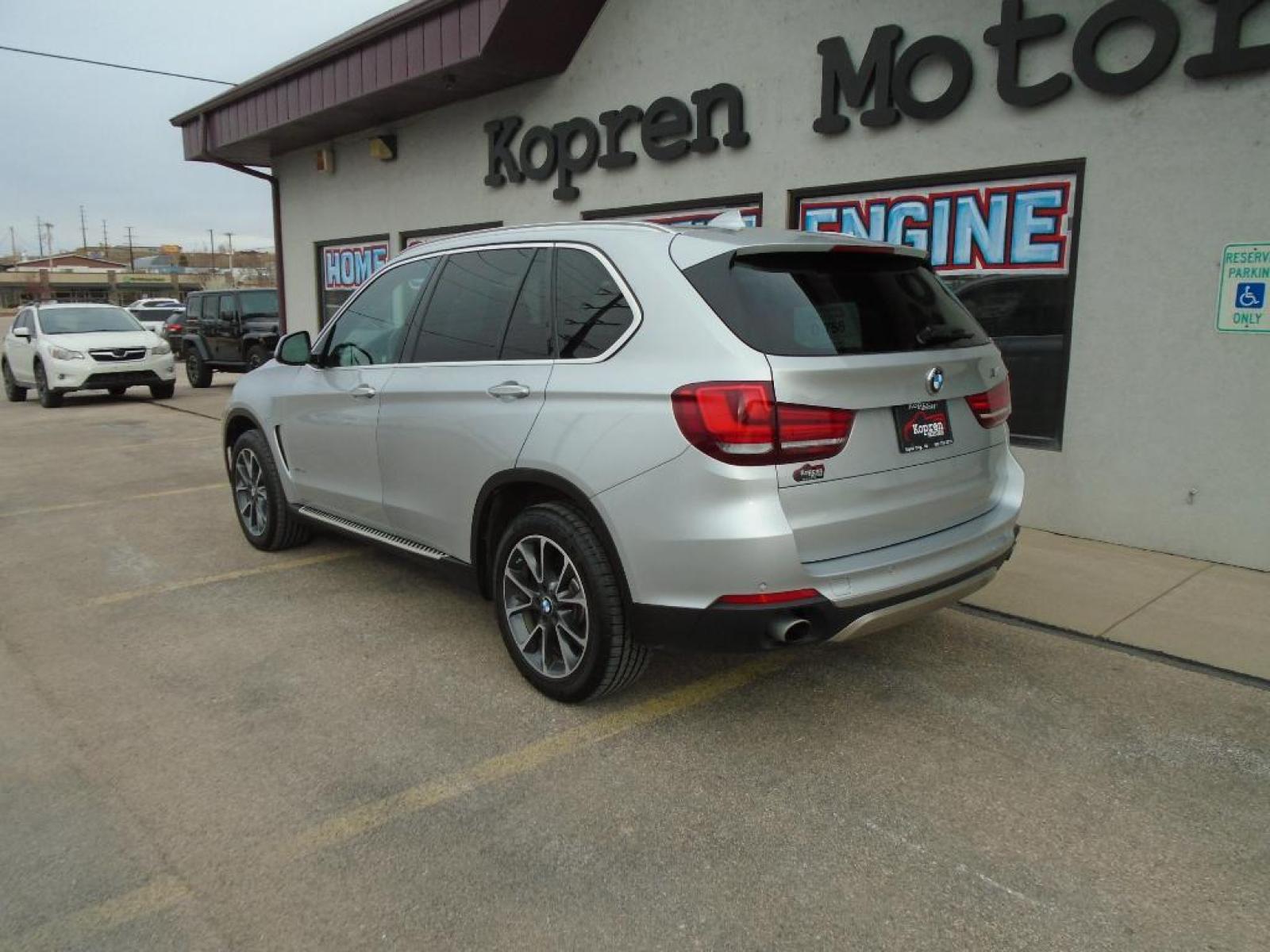 2016 SILVER BMW X5 xDrive35i (5UXKR0C55G0) with an 3.0 liter Straight 6 Cylinder Engine engine, Automatic transmission, located at 222 N Cambell St., Rapid City, SD, 57701, (866) 420-2727, 44.081833, -103.191032 - The state of the art park assist system will guide you easily into any spot. You'll never again be lost in a crowded city or a country region with the navigation system on this BMW X5. This mid-size suv shines with an exquisite metallic silver exterior finish. Make room for more passengers, carry e - Photo #1