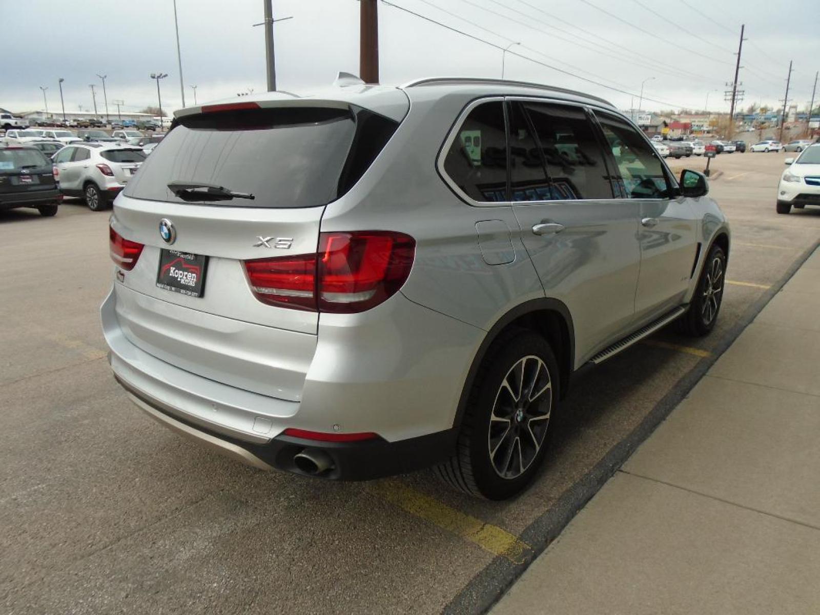 2016 SILVER BMW X5 xDrive35i (5UXKR0C55G0) with an 3.0 liter Straight 6 Cylinder Engine engine, Automatic transmission, located at 222 N Cambell St., Rapid City, SD, 57701, (866) 420-2727, 44.081833, -103.191032 - The state of the art park assist system will guide you easily into any spot. You'll never again be lost in a crowded city or a country region with the navigation system on this BMW X5. This mid-size suv shines with an exquisite metallic silver exterior finish. Make room for more passengers, carry e - Photo #3
