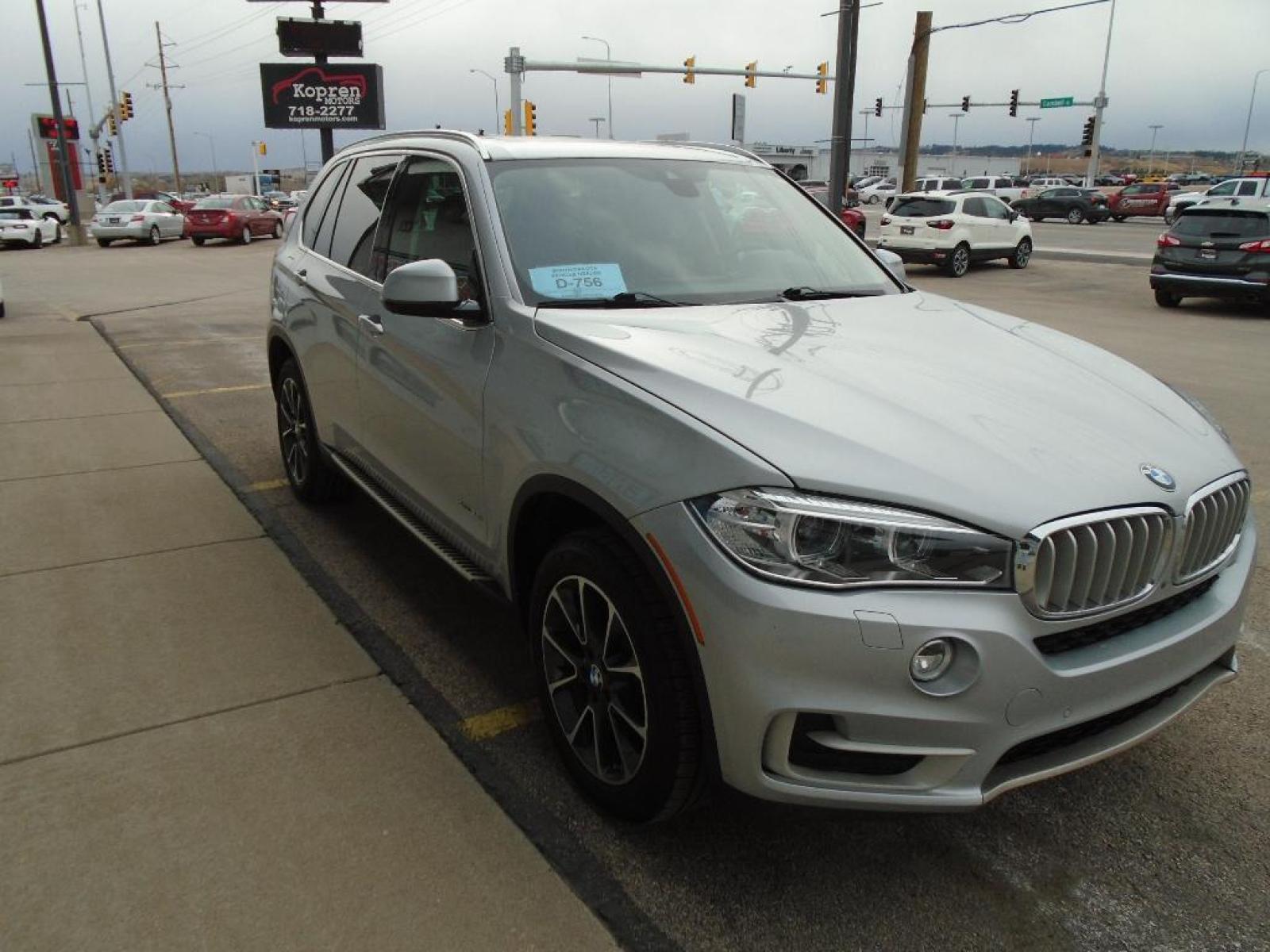 2016 SILVER BMW X5 xDrive35i (5UXKR0C55G0) with an 3.0 liter Straight 6 Cylinder Engine engine, Automatic transmission, located at 222 N Cambell St., Rapid City, SD, 57701, (866) 420-2727, 44.081833, -103.191032 - The state of the art park assist system will guide you easily into any spot. You'll never again be lost in a crowded city or a country region with the navigation system on this BMW X5. This mid-size suv shines with an exquisite metallic silver exterior finish. Make room for more passengers, carry e - Photo #4