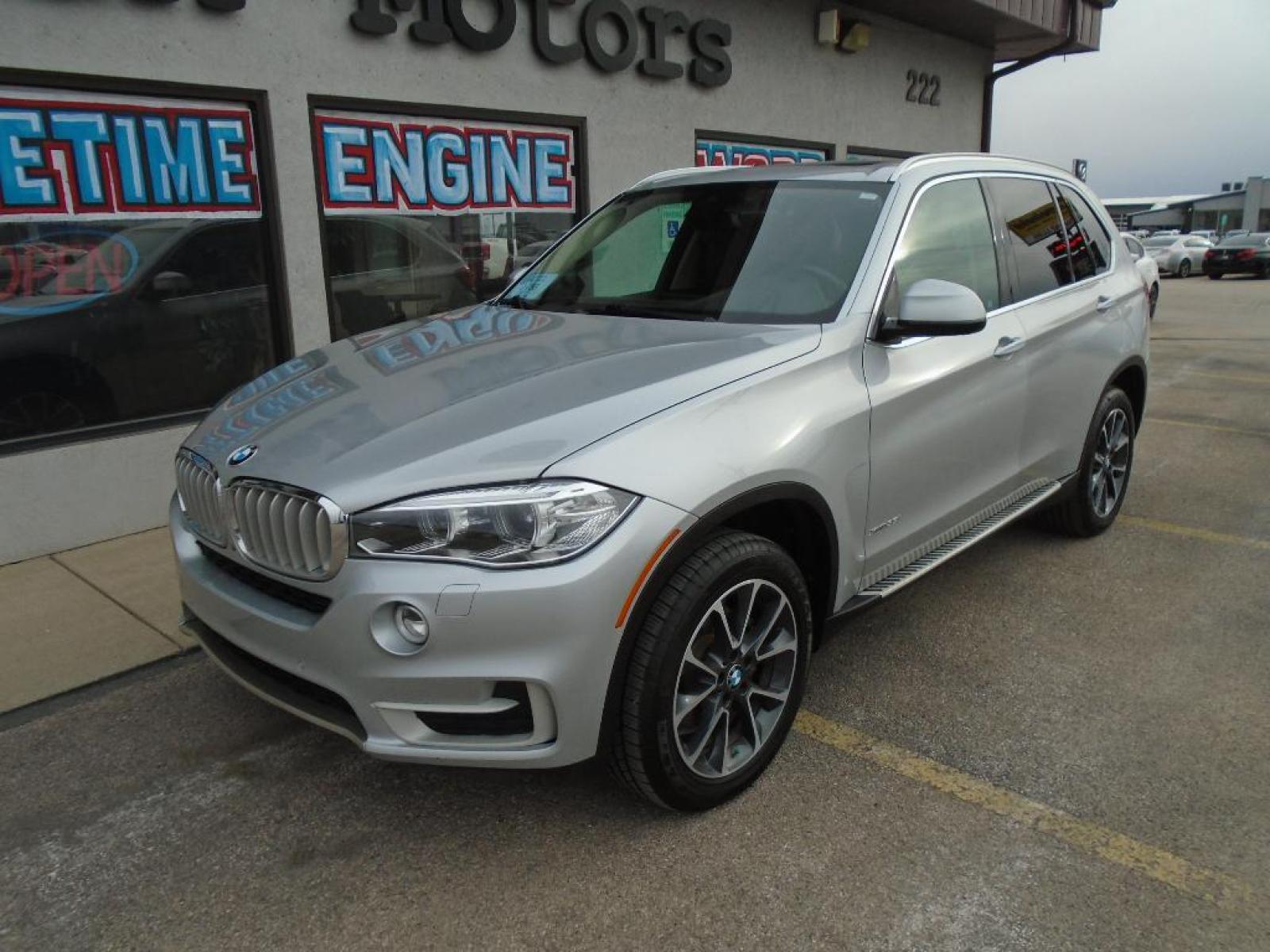 2016 SILVER BMW X5 xDrive35i (5UXKR0C55G0) with an 3.0 liter Straight 6 Cylinder Engine engine, Automatic transmission, located at 222 N Cambell St., Rapid City, SD, 57701, (866) 420-2727, 44.081833, -103.191032 - The state of the art park assist system will guide you easily into any spot. You'll never again be lost in a crowded city or a country region with the navigation system on this BMW X5. This mid-size suv shines with an exquisite metallic silver exterior finish. Make room for more passengers, carry e - Photo #6