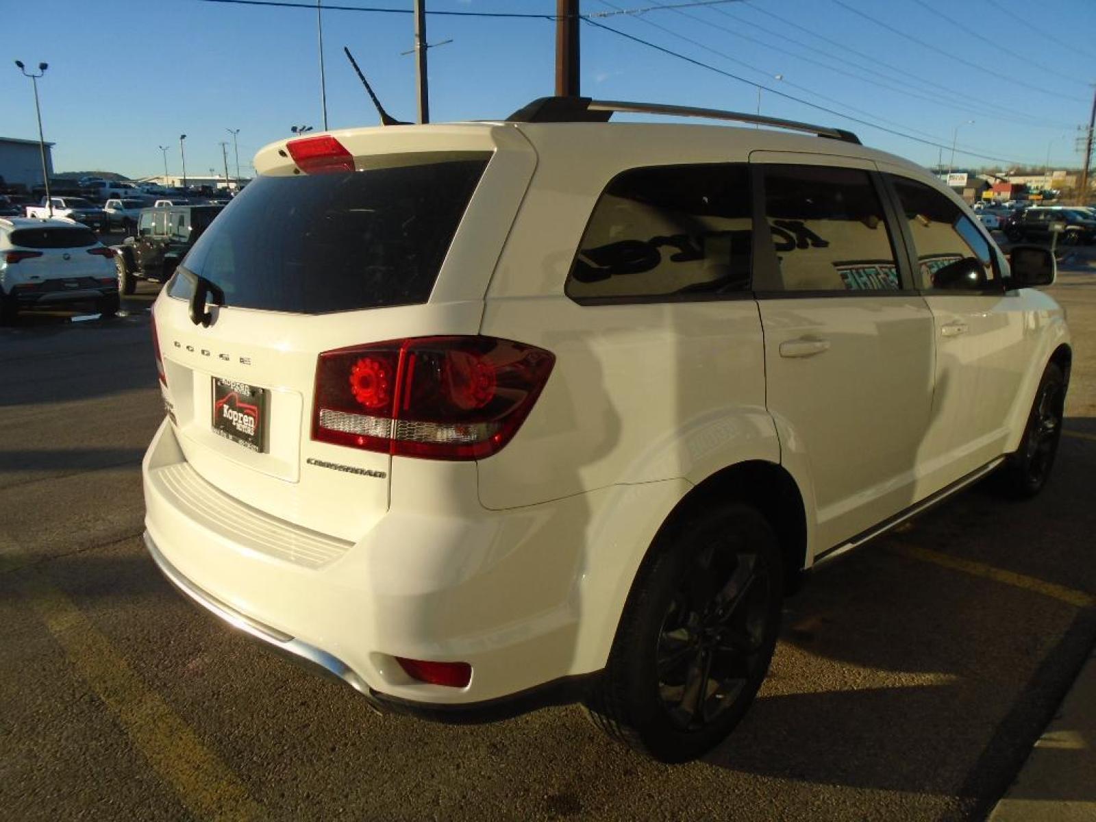 2018 WHITE /Black Dodge Journey Crossroad (3C4PDDGG4JT) with an 3.6 liter V6 Cylinder Engine engine, 6-SPEED AUTOMATIC 62TE transmission, located at 222 N Cambell St., Rapid City, SD, 57701, (866) 420-2727, 44.081833, -103.191032 - This 2018 Dodge Journey has a clean CARFAX vehicle history report. This vehicle features a hands-free Bluetooth phone system. This 2018 Dodge Journey embodies class and sophistication with its refined white exterior. This vehicle is equipped with all wheel drive. A third row of seating gives you - Photo #3