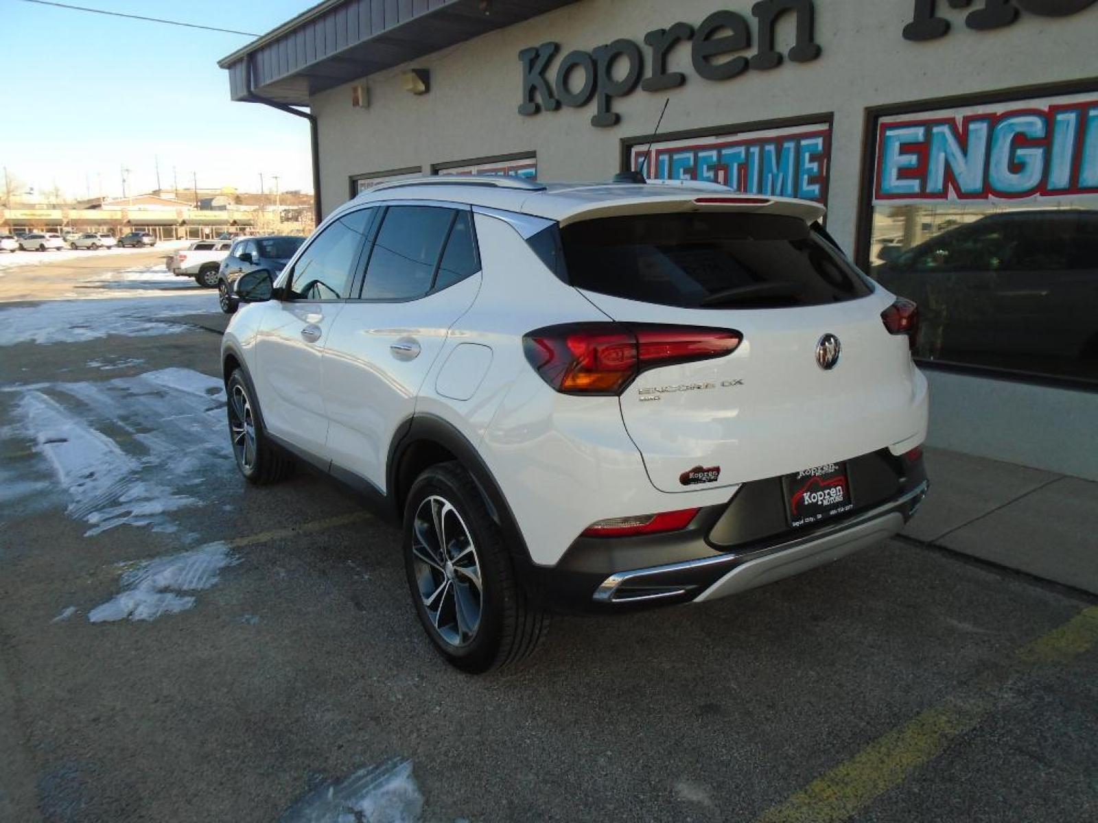 2021 WHITE Buick Encore GX Essence (KL4MMGSL1MB) with an 1.3 liter 3 Cylinder Engine engine, 9-SPEED AUTOMATIC, 9T4X, GEN 1 transmission, located at 222 N Cambell St., Rapid City, SD, 57701, (866) 420-2727, 44.081833, -103.191032 - This vehicle is a certified CARFAX 1-owner. The Buick Encore GX has a clean CARFAX vehicle history report. Protect this unit from unwanted accidents with a cutting edge backup camera system. This unit embodies class and sophistication with its refined white exterior. The vehicle has a 1.3 liter 3 C - Photo #1