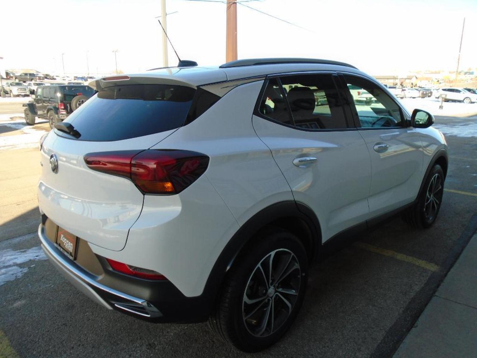 2021 WHITE Buick Encore GX Essence (KL4MMGSL1MB) with an 1.3 liter 3 Cylinder Engine engine, 9-SPEED AUTOMATIC, 9T4X, GEN 1 transmission, located at 222 N Cambell St., Rapid City, SD, 57701, (866) 420-2727, 44.081833, -103.191032 - This vehicle is a certified CARFAX 1-owner. The Buick Encore GX has a clean CARFAX vehicle history report. Protect this unit from unwanted accidents with a cutting edge backup camera system. This unit embodies class and sophistication with its refined white exterior. The vehicle has a 1.3 liter 3 C - Photo #3