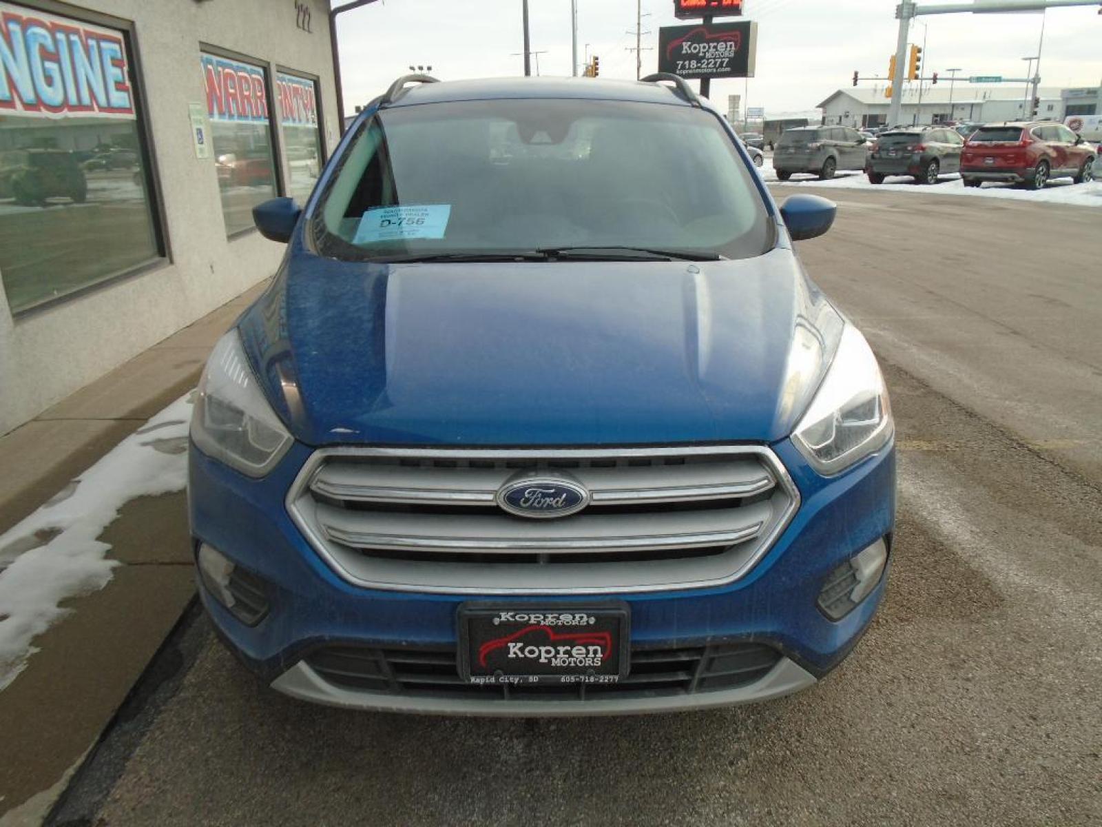 2019 Lightning Blue Metallic Ford Escape SEL (1FMCU9HD4KU) with an 1.5 liter 4 Cylinder Engine engine, 6-SPEED AUTOMATIC W/SELECTSHIFT transmission, located at 222 N Cambell St., Rapid City, SD, 57701, (866) 420-2727, 44.081833, -103.191032 - It has a clean CARFAX vehicle history report. The state of the art park assist system will guide you easily into any spot. Protect this unit from unwanted accidents with a cutting edge backup camera system. Never get into a cold vehicle again with the remote start feature on this unit. This vehicle - Photo #5