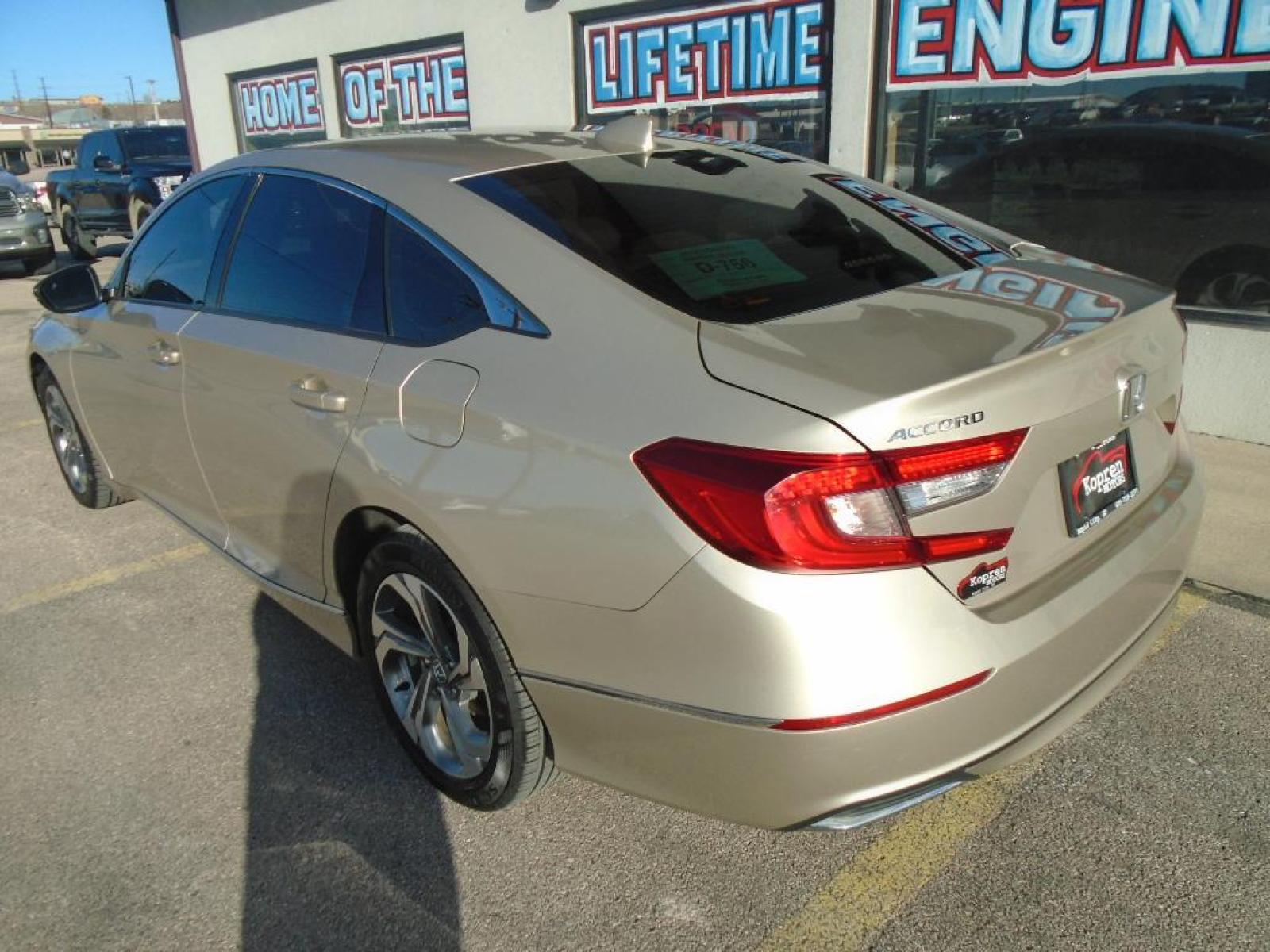 2019 Champagne Frost Pearl Honda Accord EX-L 1.5T (1HGCV1F54KA) with an 1.5 liter 4 Cylinder Engine engine, Continuously Variable transmission, located at 222 N Cambell St., Rapid City, SD, 57701, (866) 420-2727, 44.081833, -103.191032 - Protect this Honda Accord from unwanted accidents with a cutting edge backup camera system. This vehicle is a certified CARFAX 1-owner. This 2019 Honda Accord has a clean CARFAX vehicle history report. Control your garage door with its built in HomeLink System. It features elegant lines colored wit - Photo #1