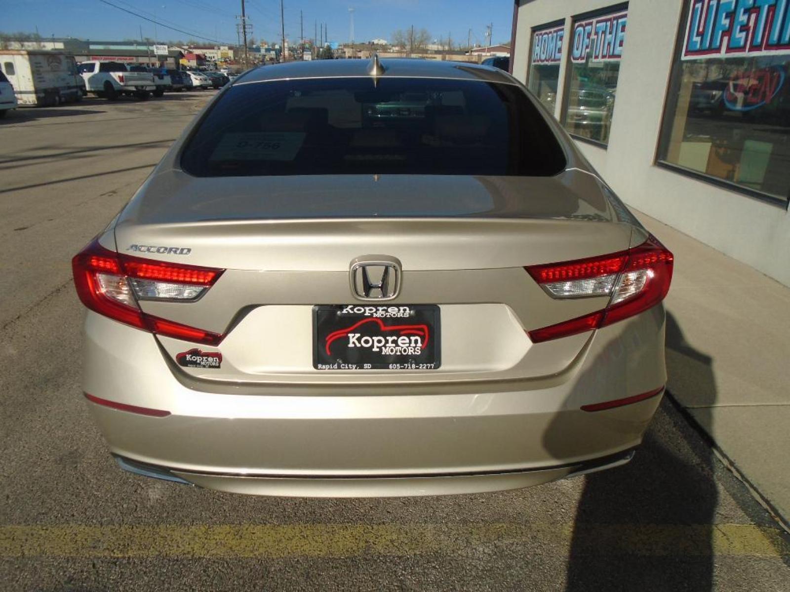 2019 Champagne Frost Pearl Honda Accord EX-L 1.5T (1HGCV1F54KA) with an 1.5 liter 4 Cylinder Engine engine, Continuously Variable transmission, located at 222 N Cambell St., Rapid City, SD, 57701, (866) 420-2727, 44.081833, -103.191032 - Protect this Honda Accord from unwanted accidents with a cutting edge backup camera system. This vehicle is a certified CARFAX 1-owner. This 2019 Honda Accord has a clean CARFAX vehicle history report. Control your garage door with its built in HomeLink System. It features elegant lines colored wit - Photo #2