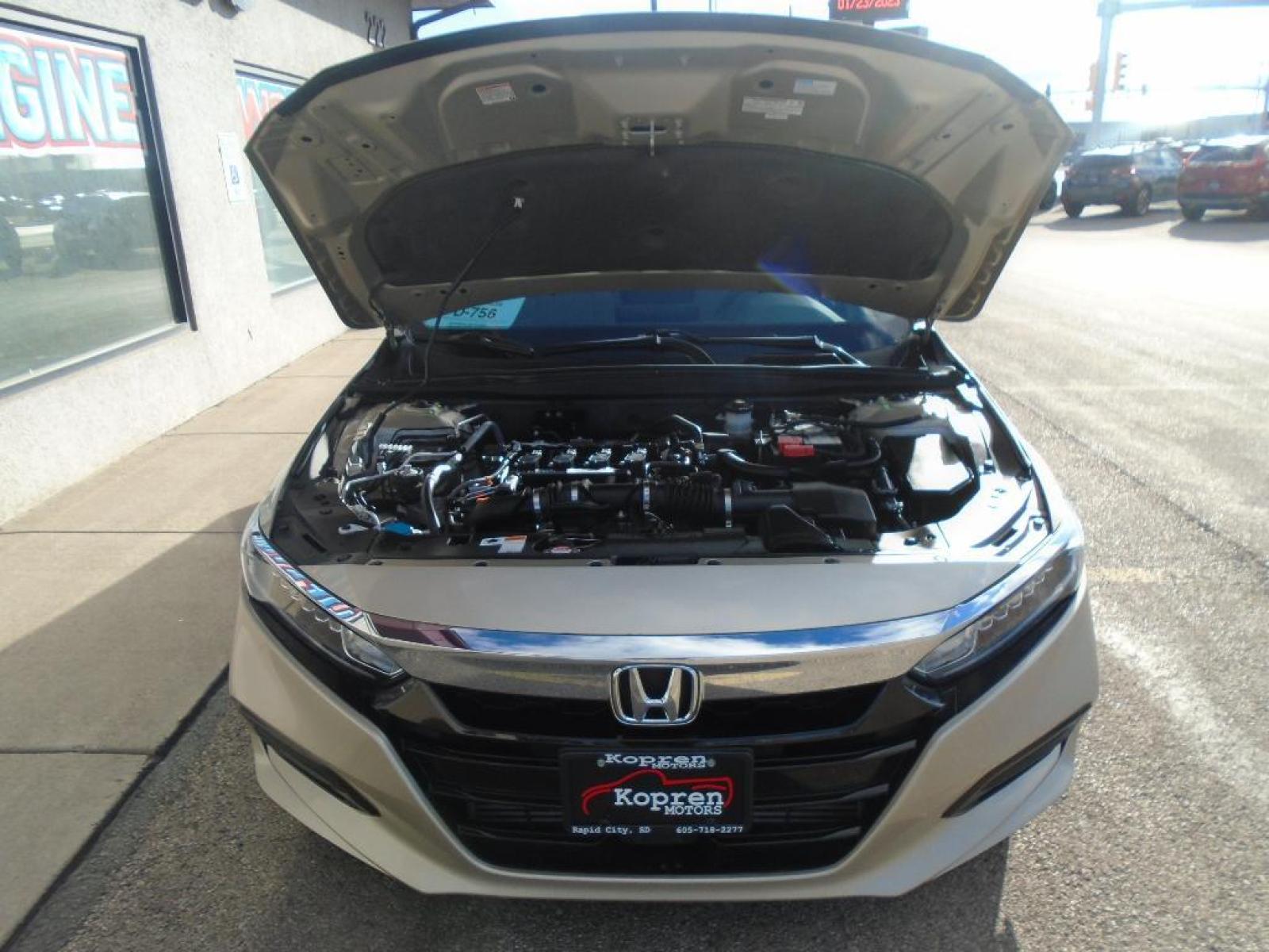 2019 Champagne Frost Pearl Honda Accord EX-L 1.5T (1HGCV1F54KA) with an 1.5 liter 4 Cylinder Engine engine, Continuously Variable transmission, located at 222 N Cambell St., Rapid City, SD, 57701, (866) 420-2727, 44.081833, -103.191032 - Protect this Honda Accord from unwanted accidents with a cutting edge backup camera system. This vehicle is a certified CARFAX 1-owner. This 2019 Honda Accord has a clean CARFAX vehicle history report. Control your garage door with its built in HomeLink System. It features elegant lines colored wit - Photo #36