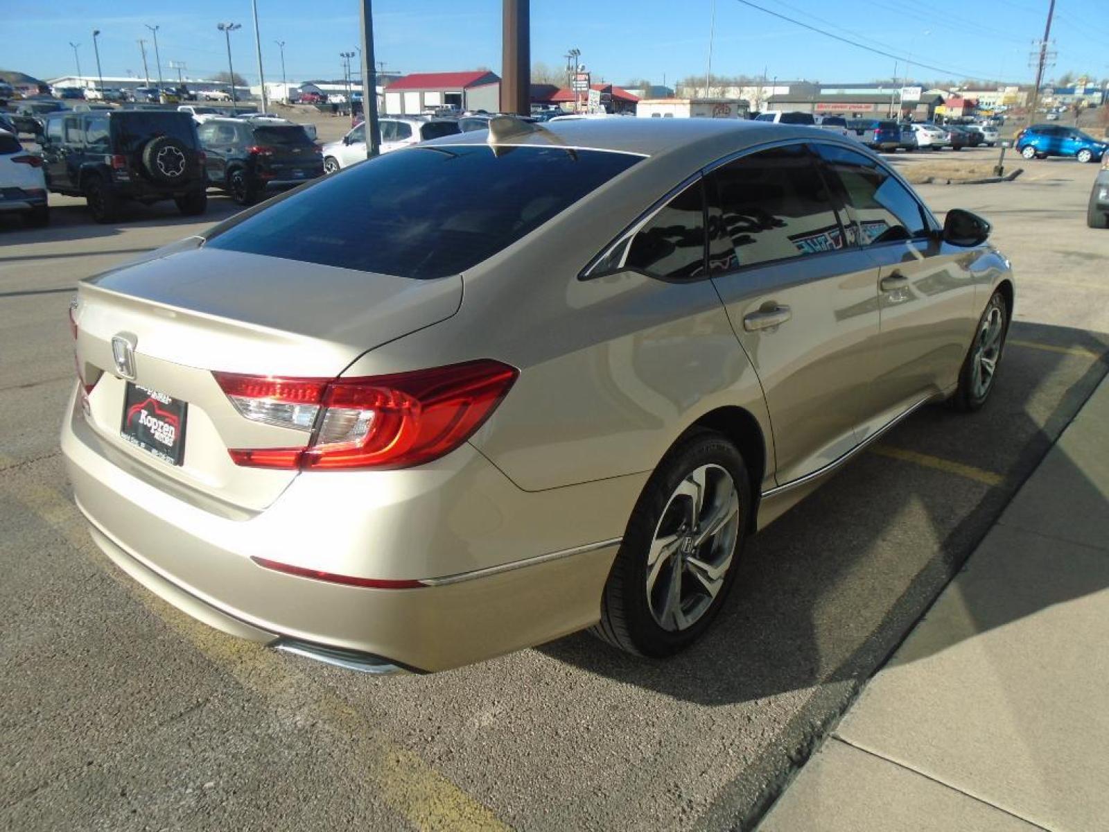 2019 Champagne Frost Pearl Honda Accord EX-L 1.5T (1HGCV1F54KA) with an 1.5 liter 4 Cylinder Engine engine, Continuously Variable transmission, located at 222 N Cambell St., Rapid City, SD, 57701, (866) 420-2727, 44.081833, -103.191032 - Protect this Honda Accord from unwanted accidents with a cutting edge backup camera system. This vehicle is a certified CARFAX 1-owner. This 2019 Honda Accord has a clean CARFAX vehicle history report. Control your garage door with its built in HomeLink System. It features elegant lines colored wit - Photo #3
