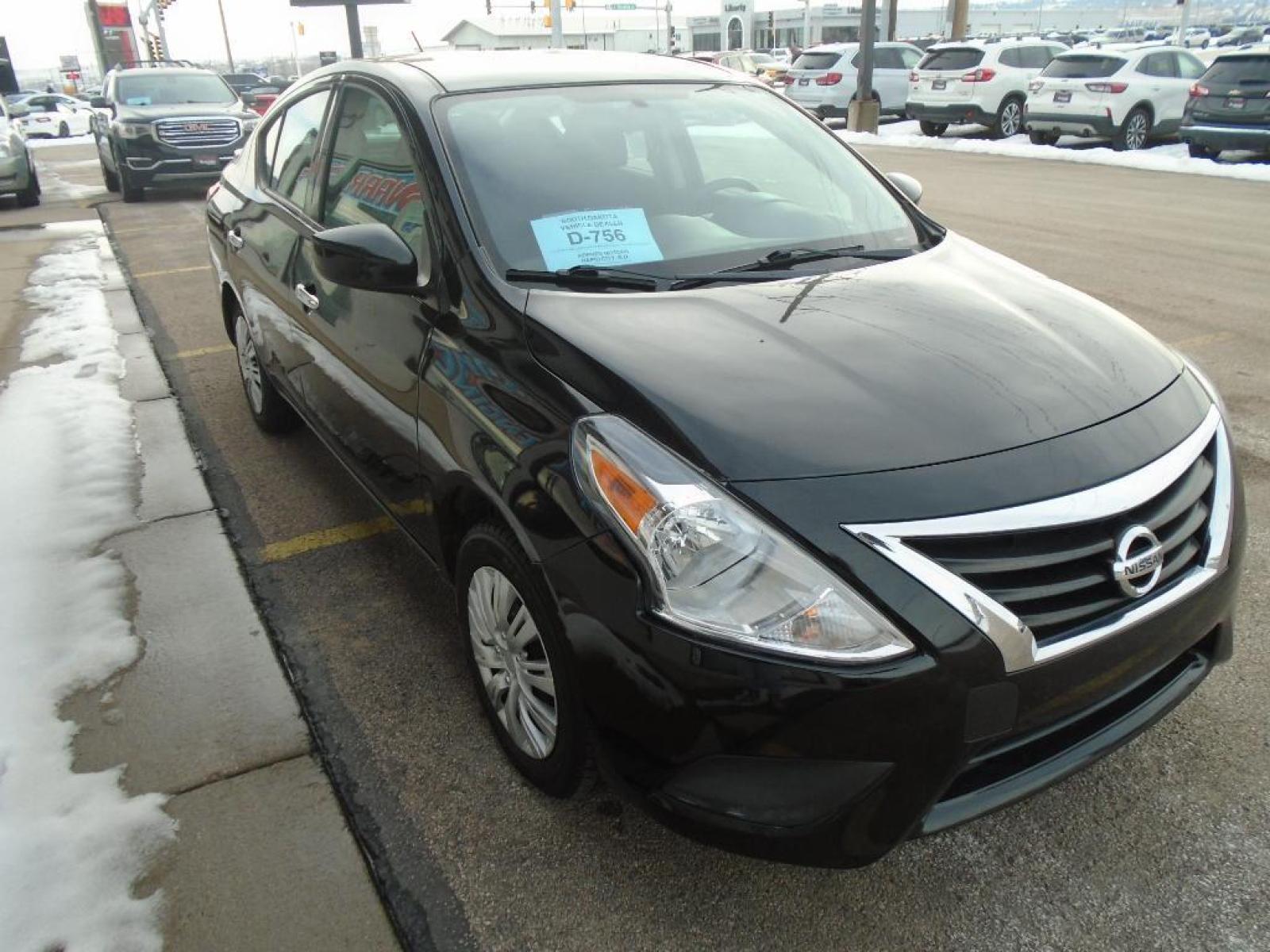 2019 Super Black /Charcoal Nissan Versa SV (3N1CN7AP8KL) with an 1.6 liter 4 Cylinder Engine engine, Xtronic CVT transmission, located at 222 N Cambell St., Rapid City, SD, 57701, (866) 420-2727, 44.081833, -103.191032 - See what's behind you with the back up camera on this small car. It features a hands-free Bluetooth phone system. This model is painted with a sleek and sophisticated black color. This Nissan Versa has a 1.6 liter 4 Cylinder Engine high output engine. It is front wheel drive. This vehicle is equippe - Photo #4
