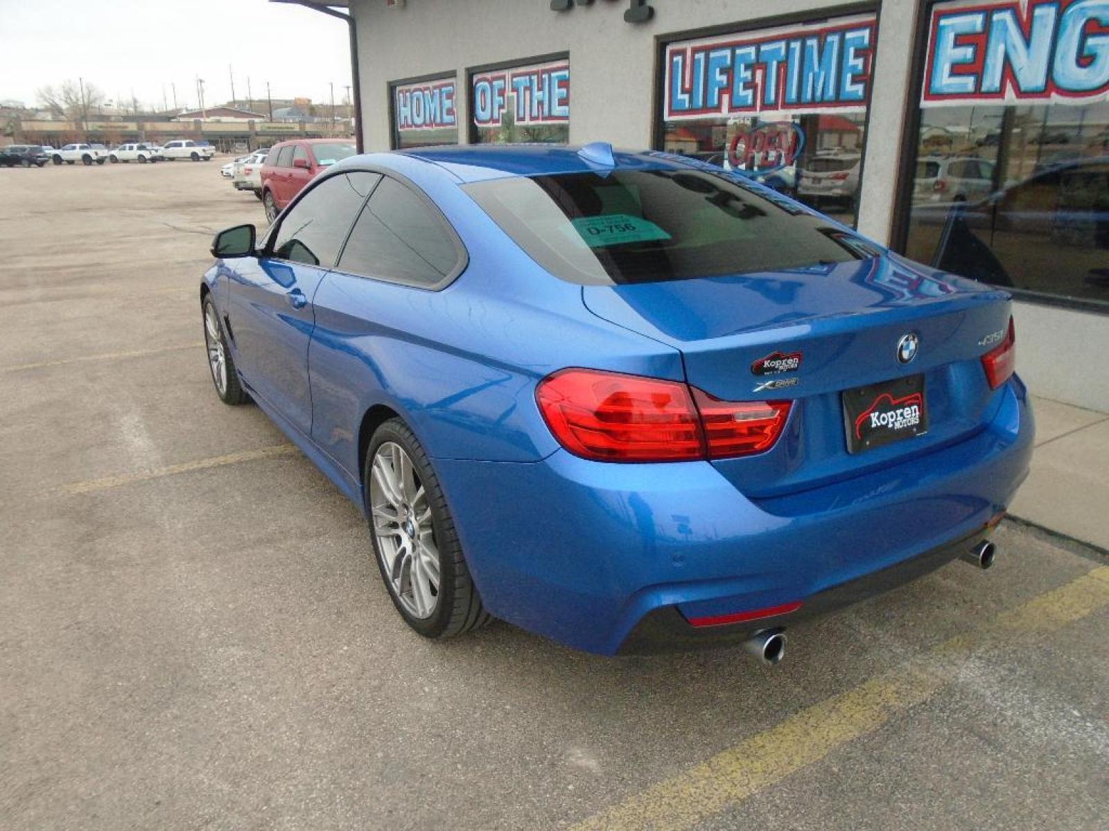 2014 BLUE BMW 4 series 435i xDrive (WBA3R5C58EF) with an 3.0 liter Straight 6 Cylinder Engine engine, Automatic transmission, located at 222 N Cambell St., Rapid City, SD, 57701, (866) 420-2727, 44.081833, -103.191032 - This 2014 BMW 4 series has a 3.0 liter Straight 6 Cylinder Engine high output engine. This small car shines with an exquisite blue finish. This model is equipped with all wheel drive. This BMW 4 series is equipped with a gasoline engine. The high efficiency automatic transmission shifts smoothly an - Photo #1