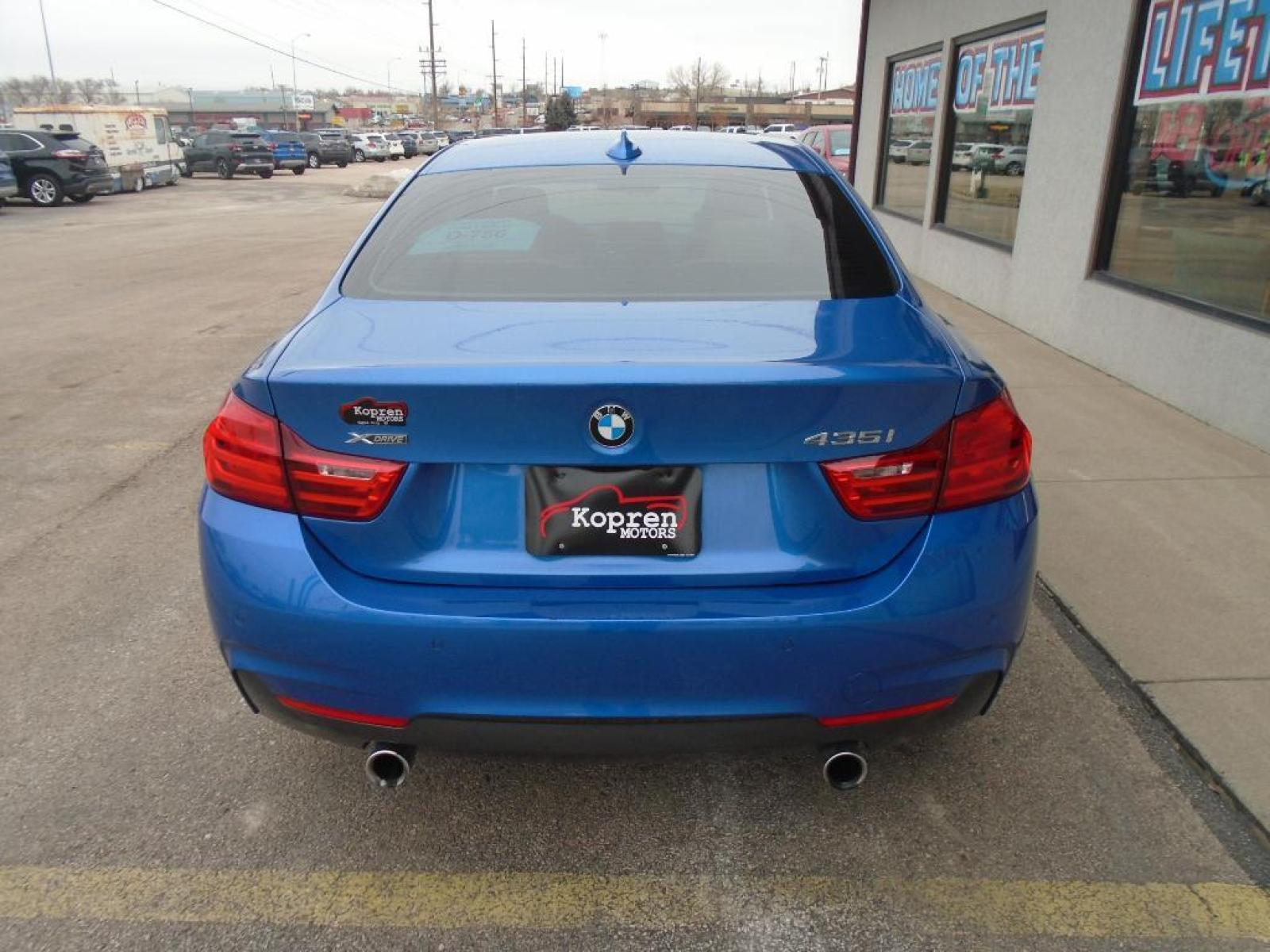 2014 BLUE BMW 4 series 435i xDrive (WBA3R5C58EF) with an 3.0 liter Straight 6 Cylinder Engine engine, Automatic transmission, located at 222 N Cambell St., Rapid City, SD, 57701, (866) 420-2727, 44.081833, -103.191032 - This 2014 BMW 4 series has a 3.0 liter Straight 6 Cylinder Engine high output engine. This small car shines with an exquisite blue finish. This model is equipped with all wheel drive. This BMW 4 series is equipped with a gasoline engine. The high efficiency automatic transmission shifts smoothly an - Photo #2