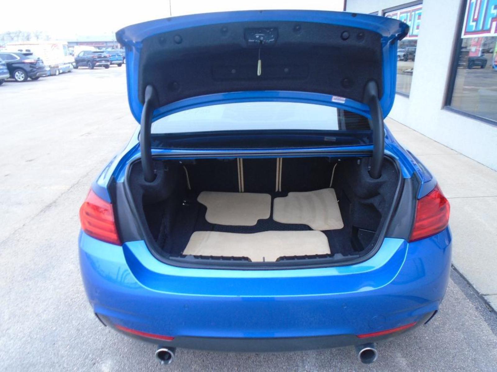 2014 BLUE BMW 4 series 435i xDrive (WBA3R5C58EF) with an 3.0 liter Straight 6 Cylinder Engine engine, Automatic transmission, located at 222 N Cambell St., Rapid City, SD, 57701, (866) 420-2727, 44.081833, -103.191032 - This 2014 BMW 4 series has a 3.0 liter Straight 6 Cylinder Engine high output engine. This small car shines with an exquisite blue finish. This model is equipped with all wheel drive. This BMW 4 series is equipped with a gasoline engine. The high efficiency automatic transmission shifts smoothly an - Photo #31