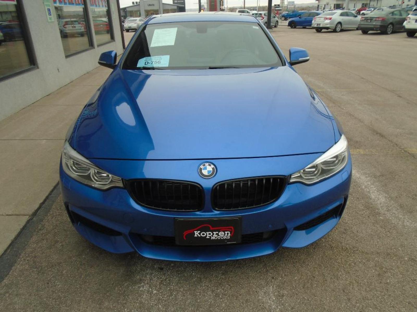 2014 BLUE BMW 4 series 435i xDrive (WBA3R5C58EF) with an 3.0 liter Straight 6 Cylinder Engine engine, Automatic transmission, located at 222 N Cambell St., Rapid City, SD, 57701, (866) 420-2727, 44.081833, -103.191032 - This 2014 BMW 4 series has a 3.0 liter Straight 6 Cylinder Engine high output engine. This small car shines with an exquisite blue finish. This model is equipped with all wheel drive. This BMW 4 series is equipped with a gasoline engine. The high efficiency automatic transmission shifts smoothly an - Photo #5