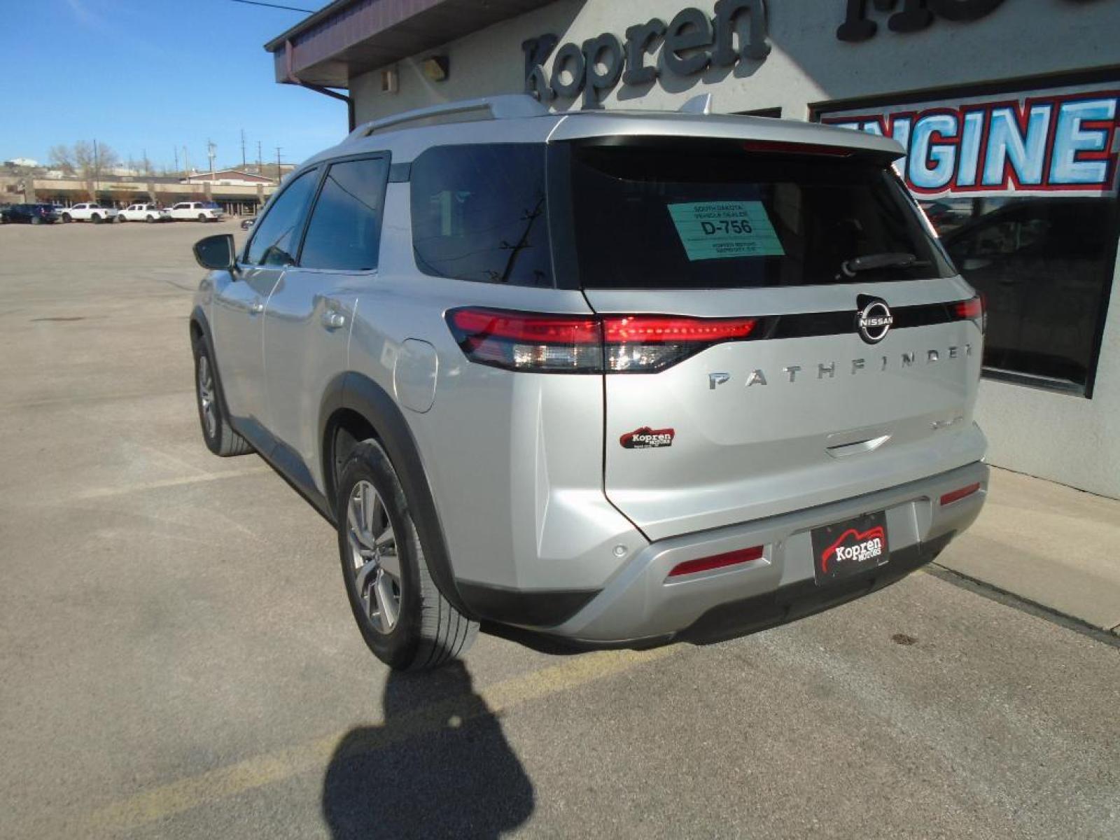 2022 Brilliant Silver Metallic Nissan Pathfinder SL (5N1DR3CCXNC) with an 3.5 liter V6 Cylinder Engine engine, Automatic transmission, located at 222 N Cambell St., Rapid City, SD, 57701, (866) 420-2727, 44.081833, -103.191032 - You'll never again be lost in a crowded city or a country region with the navigation system on this 2022 Nissan Pathfinder . This Nissan Pathfinder has a clean CARFAX vehicle history report. The state of the art park assist system will guide you easily into any spot. This mid-size suv has satellite - Photo #1