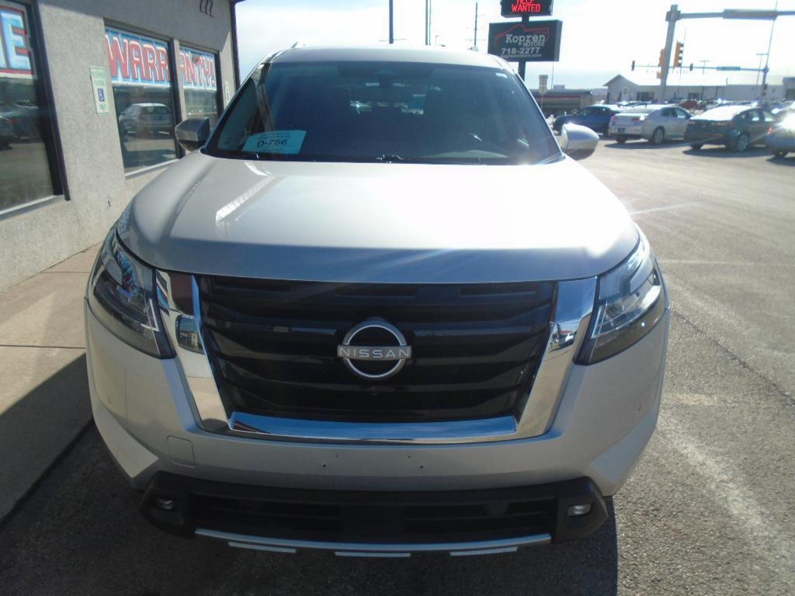 2022 Brilliant Silver Metallic Nissan Pathfinder SL (5N1DR3CCXNC) with an 3.5 liter V6 Cylinder Engine engine, Automatic transmission, located at 222 N Cambell St., Rapid City, SD, 57701, (866) 420-2727, 44.081833, -103.191032 - You'll never again be lost in a crowded city or a country region with the navigation system on this 2022 Nissan Pathfinder . This Nissan Pathfinder has a clean CARFAX vehicle history report. The state of the art park assist system will guide you easily into any spot. This mid-size suv has satellite - Photo #5