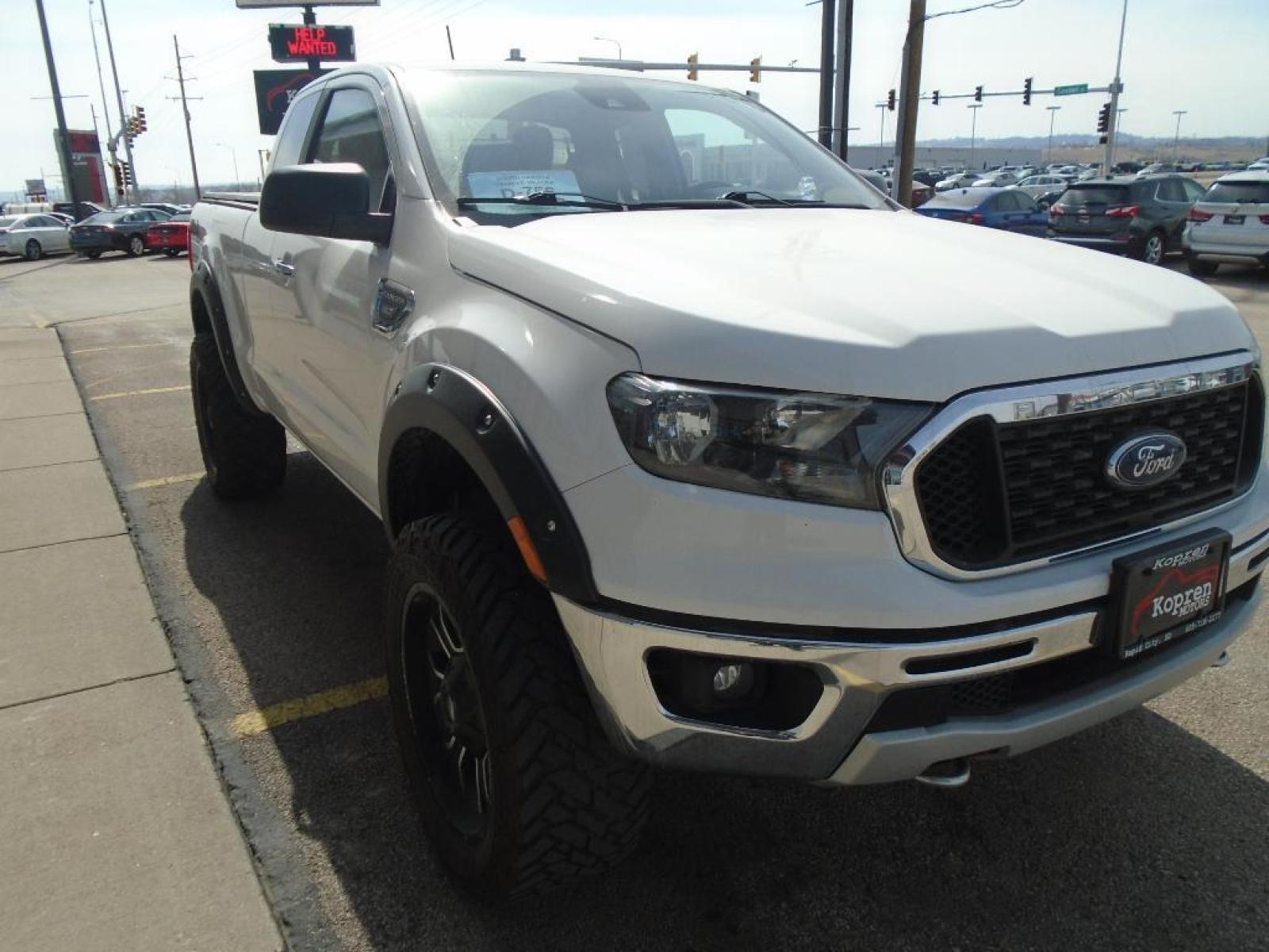 2020 Oxford White Ford Ranger XLT (1FTER1FH5LL) with an 2.3 liter 4 Cylinder Engine engine, ELECTRONIC 10-SPEED SELECTSHIFT AUTO transmission, located at 222 N Cambell St., Rapid City, SD, 57701, (866) 420-2727, 44.081833, -103.191032 - This Ford Ranger has a clean CARFAX vehicle history report. Good News! This certified CARFAX 1-owner vehicle has only had one owner before you. Protect this Ford Ranger from unwanted accidents with a cutting edge backup camera system. This 2020 Ford Ranger shines with clean polished lines coated wi - Photo #4