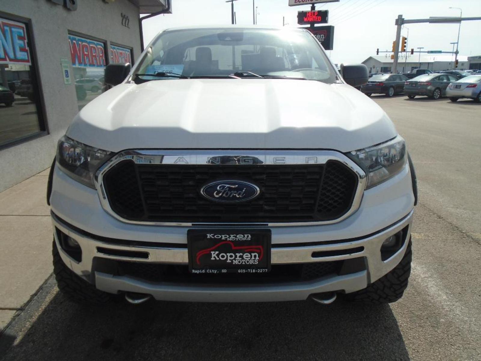2020 Oxford White Ford Ranger XLT (1FTER1FH5LL) with an 2.3 liter 4 Cylinder Engine engine, ELECTRONIC 10-SPEED SELECTSHIFT AUTO transmission, located at 222 N Cambell St., Rapid City, SD, 57701, (866) 420-2727, 44.081833, -103.191032 - This Ford Ranger has a clean CARFAX vehicle history report. Good News! This certified CARFAX 1-owner vehicle has only had one owner before you. Protect this Ford Ranger from unwanted accidents with a cutting edge backup camera system. This 2020 Ford Ranger shines with clean polished lines coated wi - Photo #5