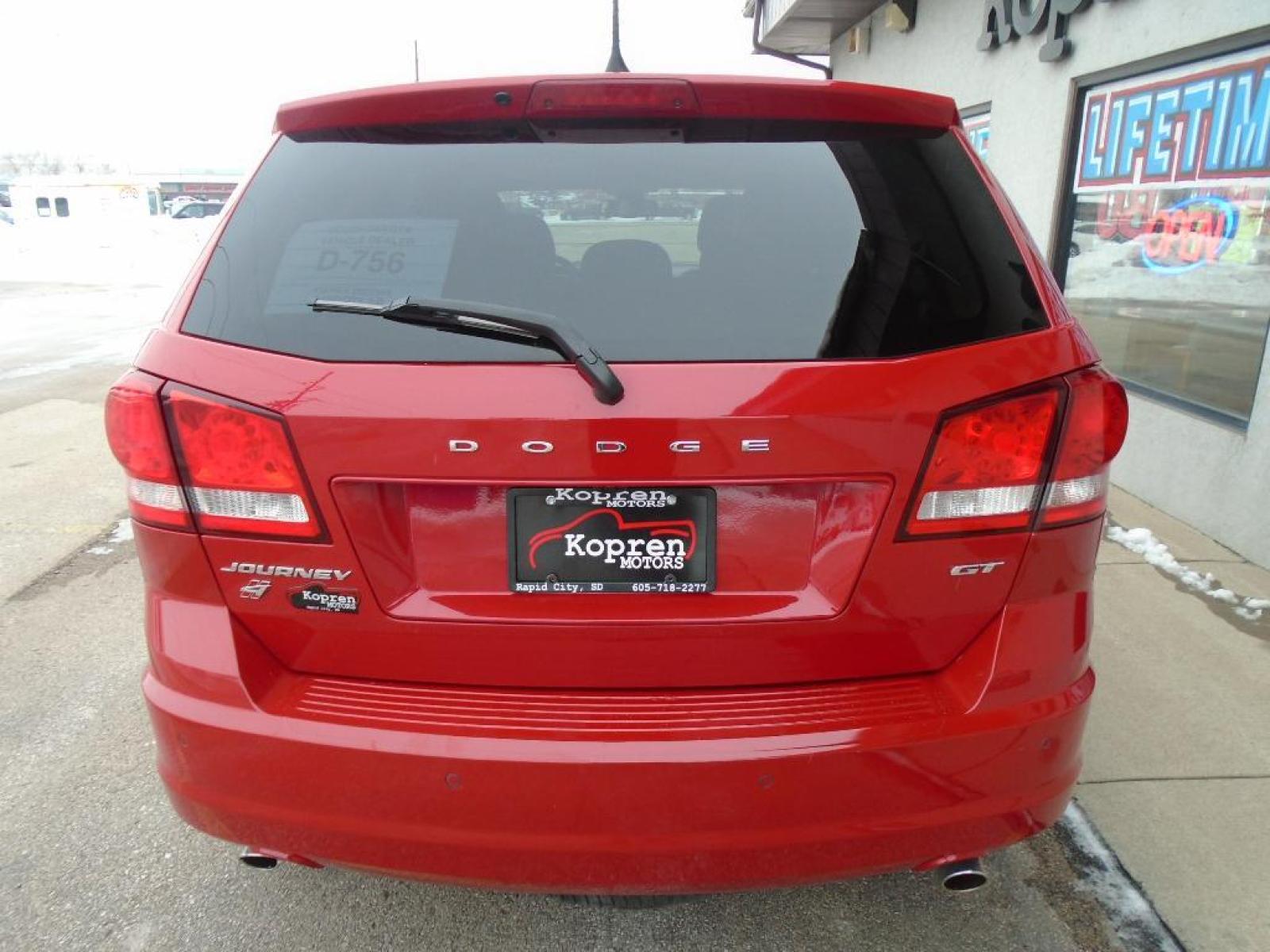 2019 Redline 2 Coat Pearl /Black/Red Dodge Journey GT (3C4PDDEG0KT) with an 3.6 liter V6 Cylinder Engine engine, 6-SPEED AUTOMATIC 62TE transmission, located at 222 N Cambell St., Rapid City, SD, 57701, (866) 420-2727, 44.081833, -103.191032 - This vehicle features a hands-free Bluetooth phone system. See what's behind you with the back up camera on this Dodge Journey. This Dodge Journey has a 3.6 liter V6 Cylinder Engine high output engine. The Dodge Journey gleams with a flashy red exterior. This model comes with third row seating for e - Photo #2