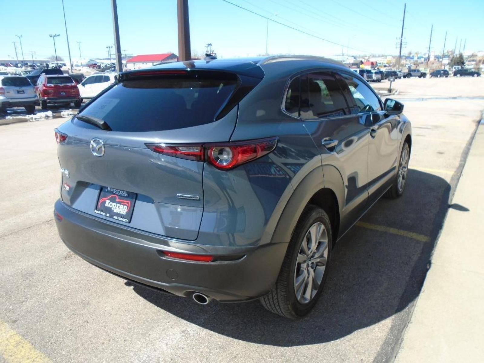 2020 Polymetal Gray Metallic /Black Mazda CX-30 Premium Package (3MVDMBEM2LM) with an L4, 2.5L engine, 6-speed automatic transmission, located at 222 N Cambell St., Rapid City, SD, 57701, (866) 420-2727, 44.081833, -103.191032 - <b>Equipment</b><br>Good News! This certified CARFAX 1-owner vehicle has only had one owner before you. Engulf yourself with the crystal clear sound of a BOSE sound system in this 2020 Mazda CX-30 . The Mazda CX-30 has satellite radio capabilities. This vehicle is equipped with the latest generatio - Photo #3