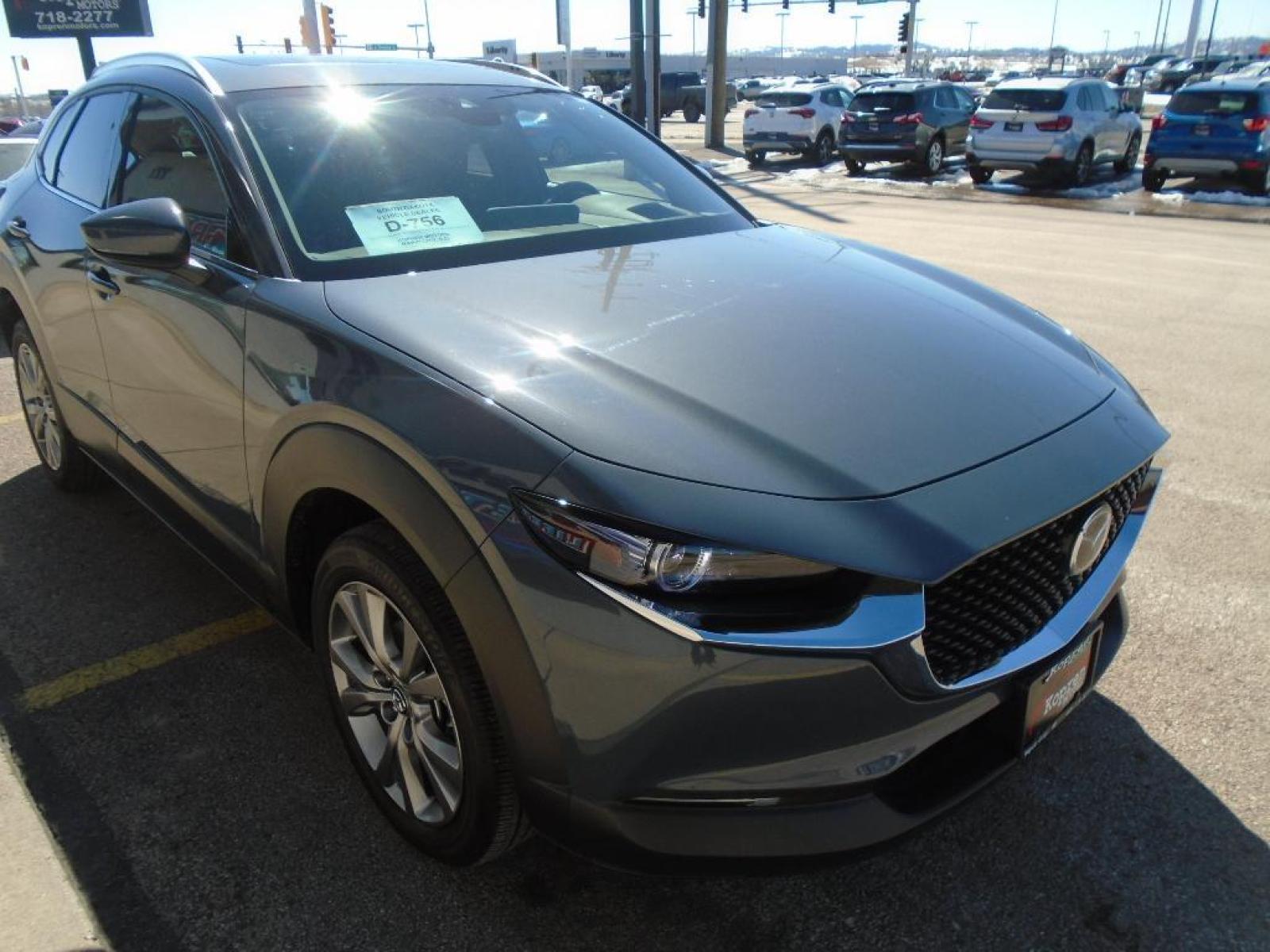 2020 Polymetal Gray Metallic /Black Mazda CX-30 Premium Package (3MVDMBEM2LM) with an L4, 2.5L engine, 6-speed automatic transmission, located at 222 N Cambell St., Rapid City, SD, 57701, (866) 420-2727, 44.081833, -103.191032 - <b>Equipment</b><br>Good News! This certified CARFAX 1-owner vehicle has only had one owner before you. Engulf yourself with the crystal clear sound of a BOSE sound system in this 2020 Mazda CX-30 . The Mazda CX-30 has satellite radio capabilities. This vehicle is equipped with the latest generatio - Photo #4