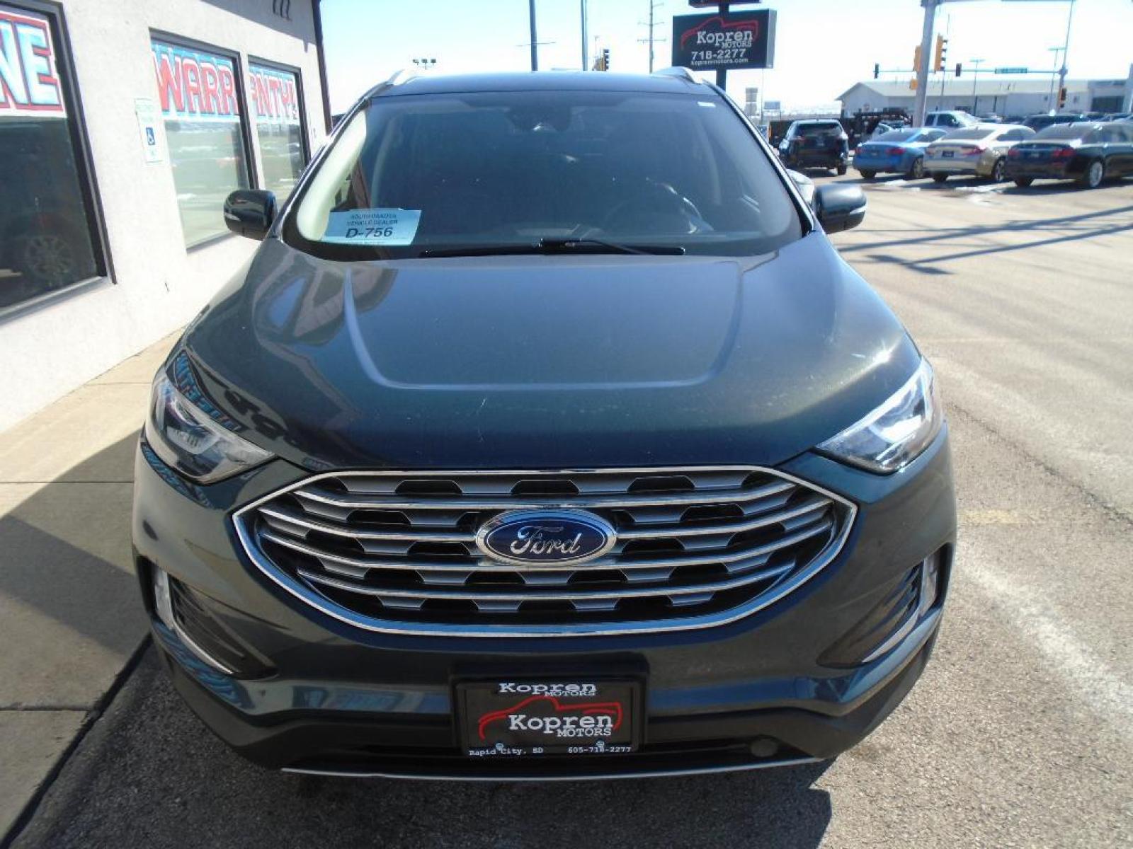 2019 Baltic Sea Green Metallic Ford Edge Titanium (2FMPK4K94KB) with an 2.0 liter 4 Cylinder Engine engine, 8-SPEED AUTOMATIC W/SELECTSHIFT transmission, located at 222 N Cambell St., Rapid City, SD, 57701, (866) 420-2727, 44.081833, -103.191032 - This vehicle is a certified CARFAX 1-owner. See what's behind you with the back up camera on it. The rear parking assist technology on it will put you at ease when reversing. The system alerts you as you get closer to an obstruction. This model features a hands-free Bluetooth phone system. This uni - Photo #5