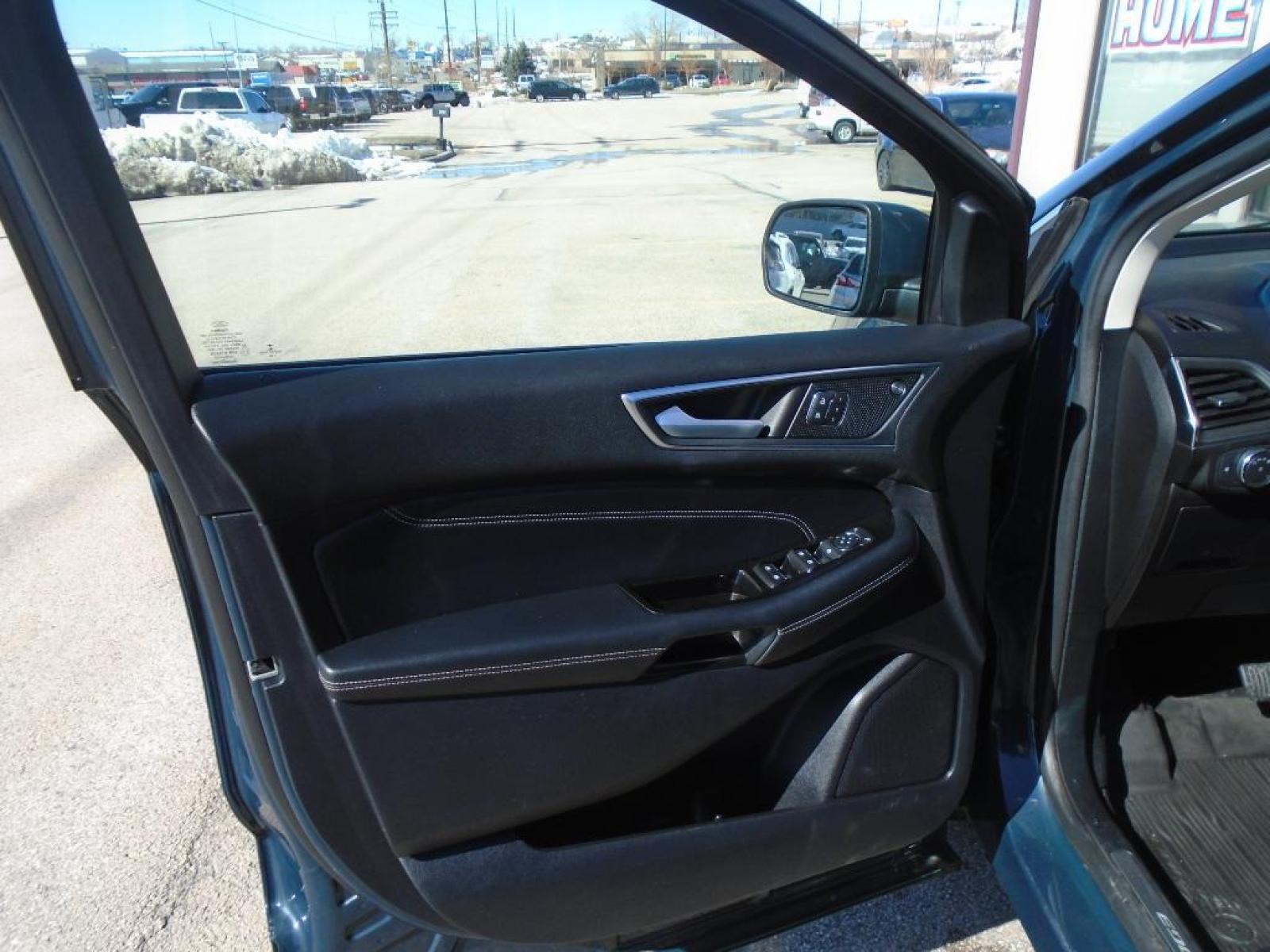 2019 Baltic Sea Green Metallic Ford Edge Titanium (2FMPK4K94KB) with an 2.0 liter 4 Cylinder Engine engine, 8-SPEED AUTOMATIC W/SELECTSHIFT transmission, located at 222 N Cambell St., Rapid City, SD, 57701, (866) 420-2727, 44.081833, -103.191032 - This vehicle is a certified CARFAX 1-owner. See what's behind you with the back up camera on it. The rear parking assist technology on it will put you at ease when reversing. The system alerts you as you get closer to an obstruction. This model features a hands-free Bluetooth phone system. This uni - Photo #8