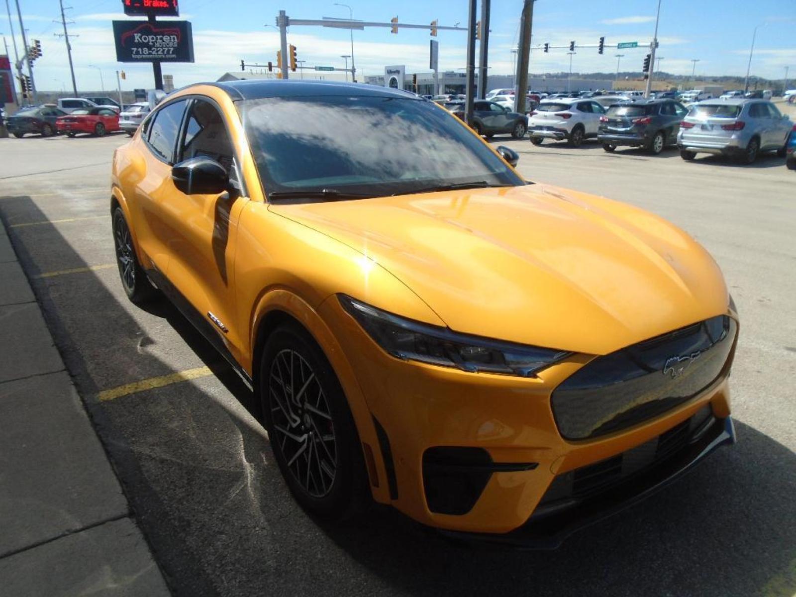 2021 Cyber Orange Metallic Tricoat /Gray w/Metallic Stitching Ford Mustang Mach-E GT (3FMTK4SX8MM) with an Electric Motor engine, Automatic transmission, located at 222 N Cambell St., Rapid City, SD, 57701, (866) 420-2727, 44.081833, -103.191032 - <b>Equipment</b><br>This model features a hands-free Bluetooth phone system. This vehicle is pure luxury with a heated steering wheel. You'll never again be lost in a crowded city or a country region with the navigation system on this 2021 Ford Mustang Mach-E . Protect this Ford Mustang Mach-E from - Photo #4