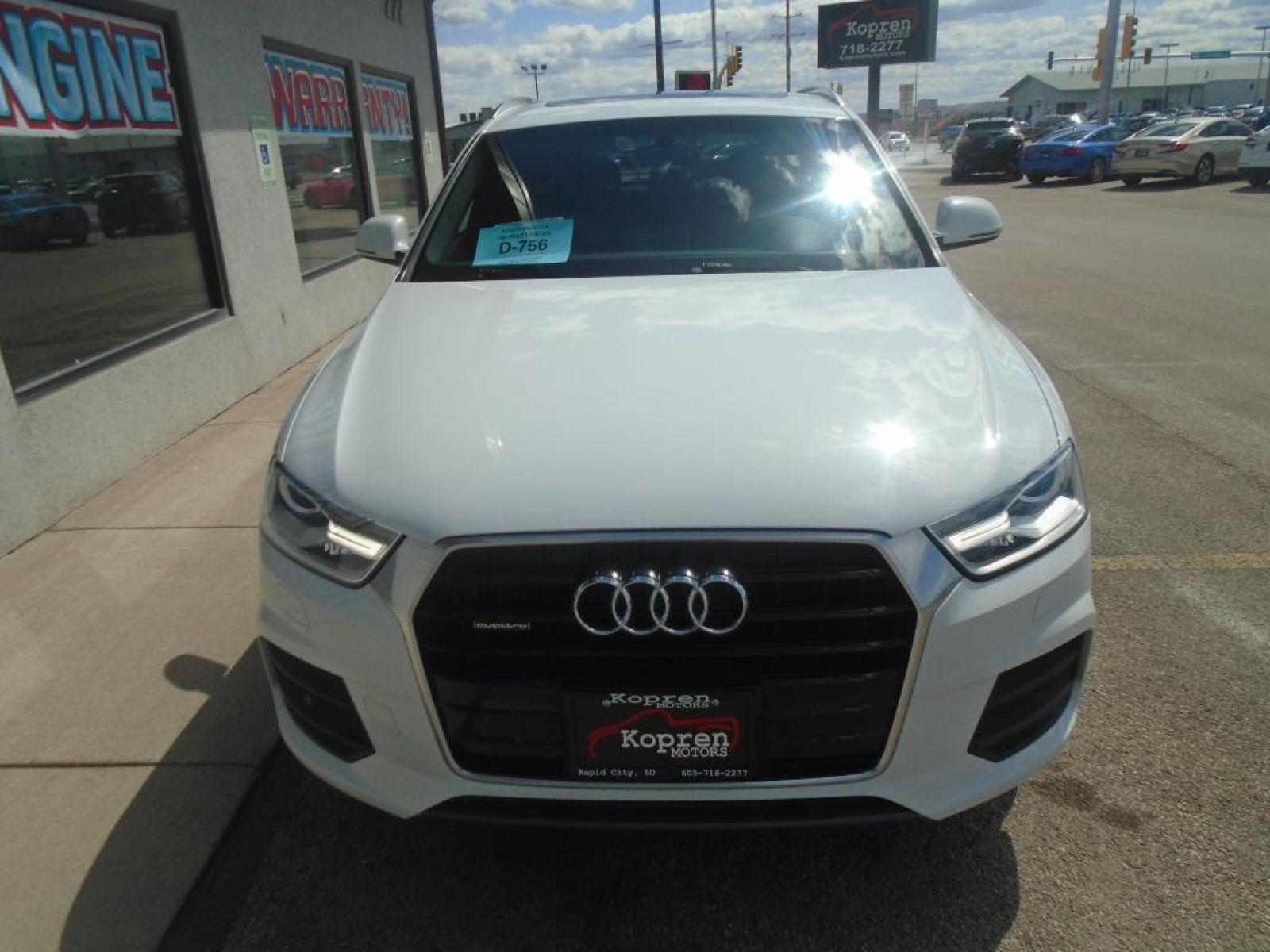 2016 Glacier White Metallic /Black Audi Q3 Premium Plus (WA1EFCFS4GR) with an L4, 2.0L engine, 6-speed automatic transmission, located at 222 N Cambell St., Rapid City, SD, 57701, (866) 420-2727, 44.081833, -103.191032 - <b>Equipment</b><br>Bluetooth technology is built into it, keeping your hands on the steering wheel and your focus on the road. Protect the Audi Q3 from unwanted accidents with a cutting edge backup camera system. This Audi Q3 has a clean CARFAX vehicle history report. See the road and the surroundi - Photo #5