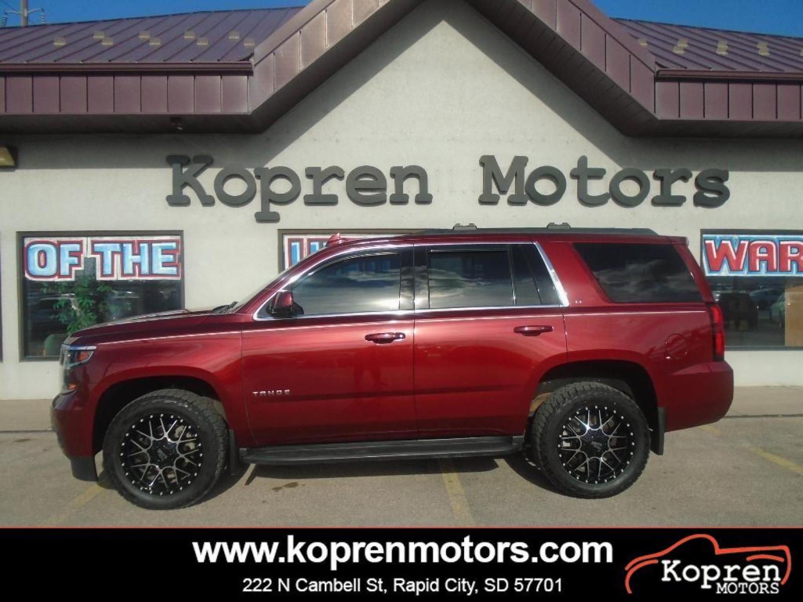 2018 Siren Red Tintcoat /Jet Black Chevrolet Tahoe LT (1GNSKBKC0JR) with an V8, 5.3L engine, 6-speed automatic transmission, located at 222 N Cambell St., Rapid City, SD, 57701, (866) 420-2727, 44.081833, -103.191032 - <b>Equipment</b><br>See what's behind you with the back up camera on this 2018 Chevrolet Tahoe . You'll never again be lost in a crowded city or a country region with the navigation system on this Chevrolet Tahoe. Engulf yourself with the crystal clear sound of a BOSE sound system in it. Bluetooth - Photo #0