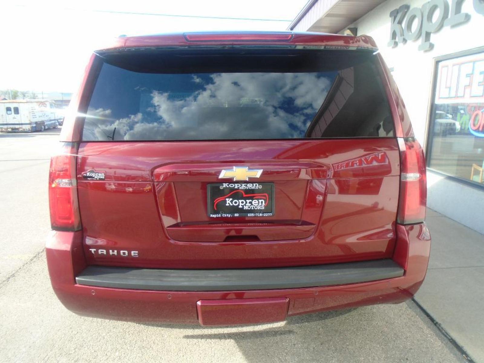 2018 Siren Red Tintcoat /Jet Black Chevrolet Tahoe LT (1GNSKBKC0JR) with an V8, 5.3L engine, 6-speed automatic transmission, located at 222 N Cambell St., Rapid City, SD, 57701, (866) 420-2727, 44.081833, -103.191032 - <b>Equipment</b><br>See what's behind you with the back up camera on this 2018 Chevrolet Tahoe . You'll never again be lost in a crowded city or a country region with the navigation system on this Chevrolet Tahoe. Engulf yourself with the crystal clear sound of a BOSE sound system in it. Bluetooth - Photo #2