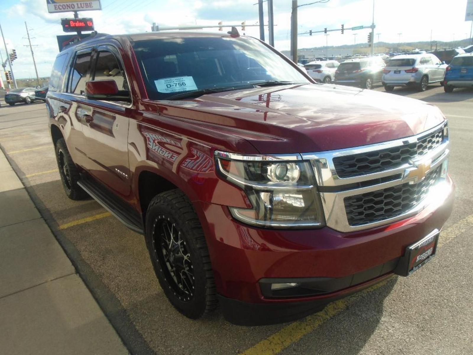 2018 Siren Red Tintcoat /Jet Black Chevrolet Tahoe LT (1GNSKBKC0JR) with an V8, 5.3L engine, 6-speed automatic transmission, located at 222 N Cambell St., Rapid City, SD, 57701, (866) 420-2727, 44.081833, -103.191032 - <b>Equipment</b><br>See what's behind you with the back up camera on this 2018 Chevrolet Tahoe . You'll never again be lost in a crowded city or a country region with the navigation system on this Chevrolet Tahoe. Engulf yourself with the crystal clear sound of a BOSE sound system in it. Bluetooth - Photo #4