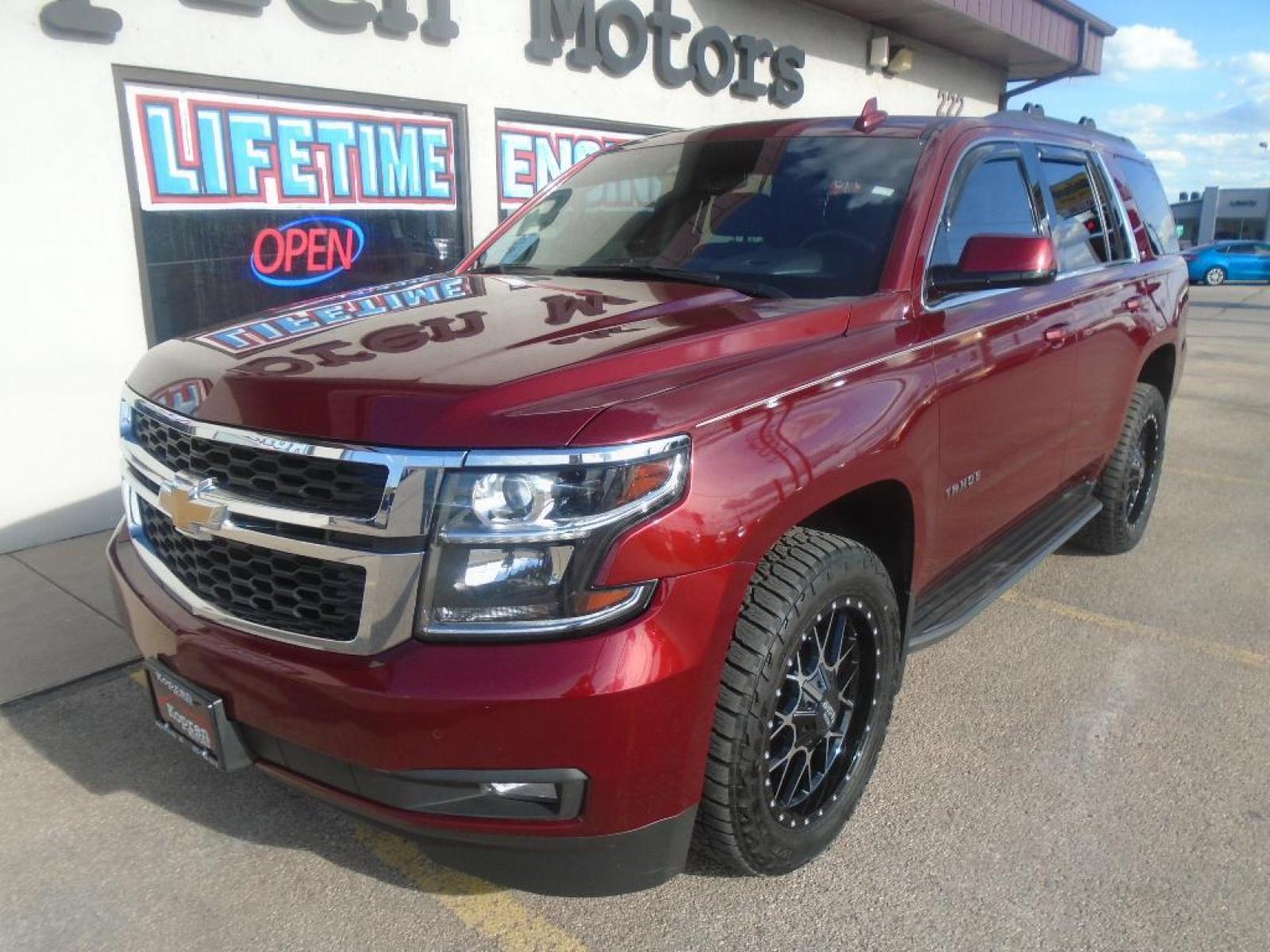 2018 Siren Red Tintcoat /Jet Black Chevrolet Tahoe LT (1GNSKBKC0JR) with an V8, 5.3L engine, 6-speed automatic transmission, located at 222 N Cambell St., Rapid City, SD, 57701, (866) 420-2727, 44.081833, -103.191032 - <b>Equipment</b><br>See what's behind you with the back up camera on this 2018 Chevrolet Tahoe . You'll never again be lost in a crowded city or a country region with the navigation system on this Chevrolet Tahoe. Engulf yourself with the crystal clear sound of a BOSE sound system in it. Bluetooth - Photo #6