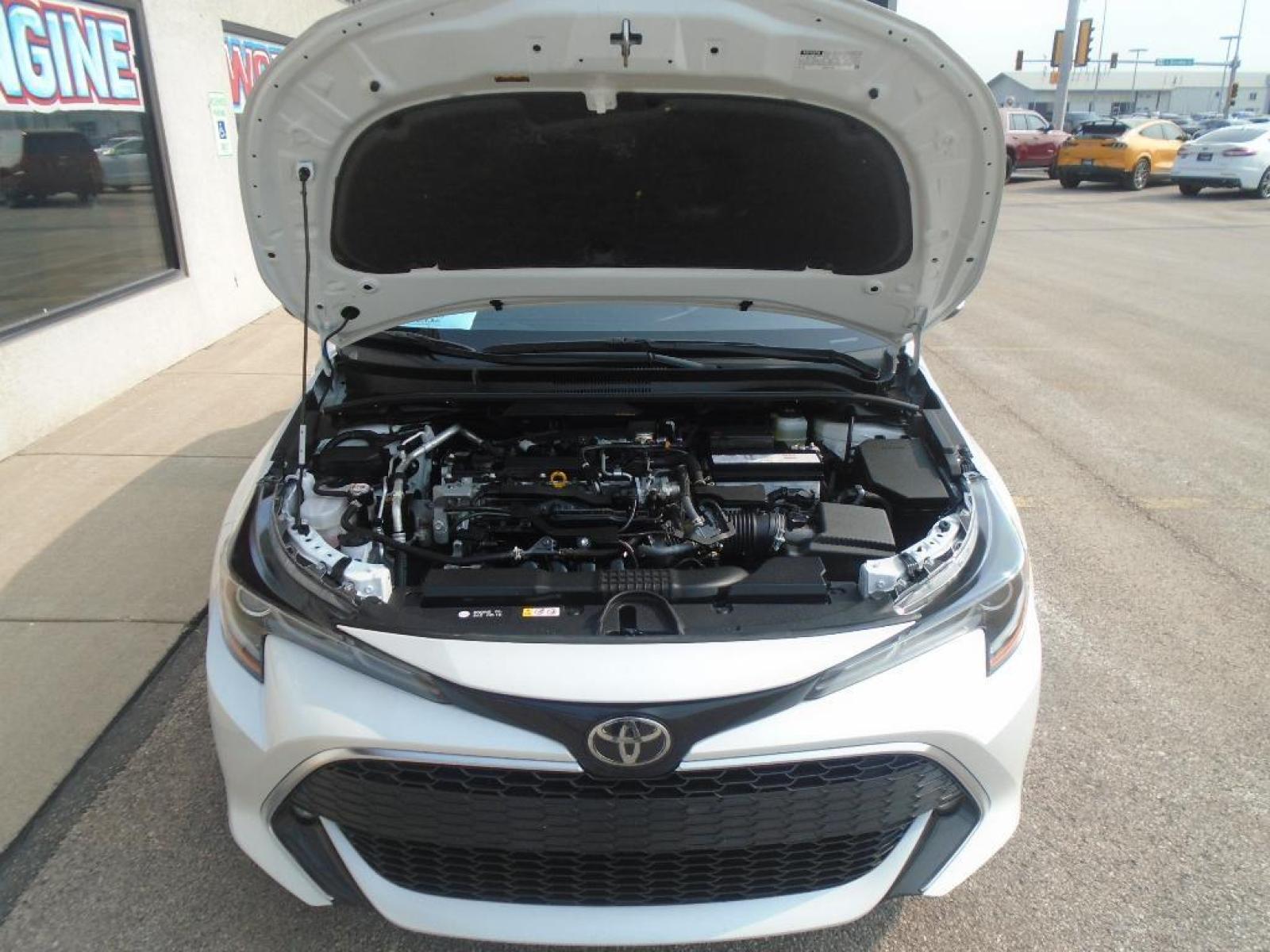 2021 Wind Chill Pearl /Moonstone Toyota Corolla Hatchback XSE (JTNA4MBE5M3) with an L4, 2.0L engine, 6-speed manual transmission, located at 222 N Cambell St., Rapid City, SD, 57701, (866) 420-2727, 44.081833, -103.191032 - <b>Equipment</b><br>Protect this Toyota Corolla Hatchback from unwanted accidents with a cutting edge backup camera system. It features a hands-free Bluetooth phone system. Our dealership has already run the CARFAX report and it is clean. A clean CARFAX is a great asset for resale value in the futu - Photo #35